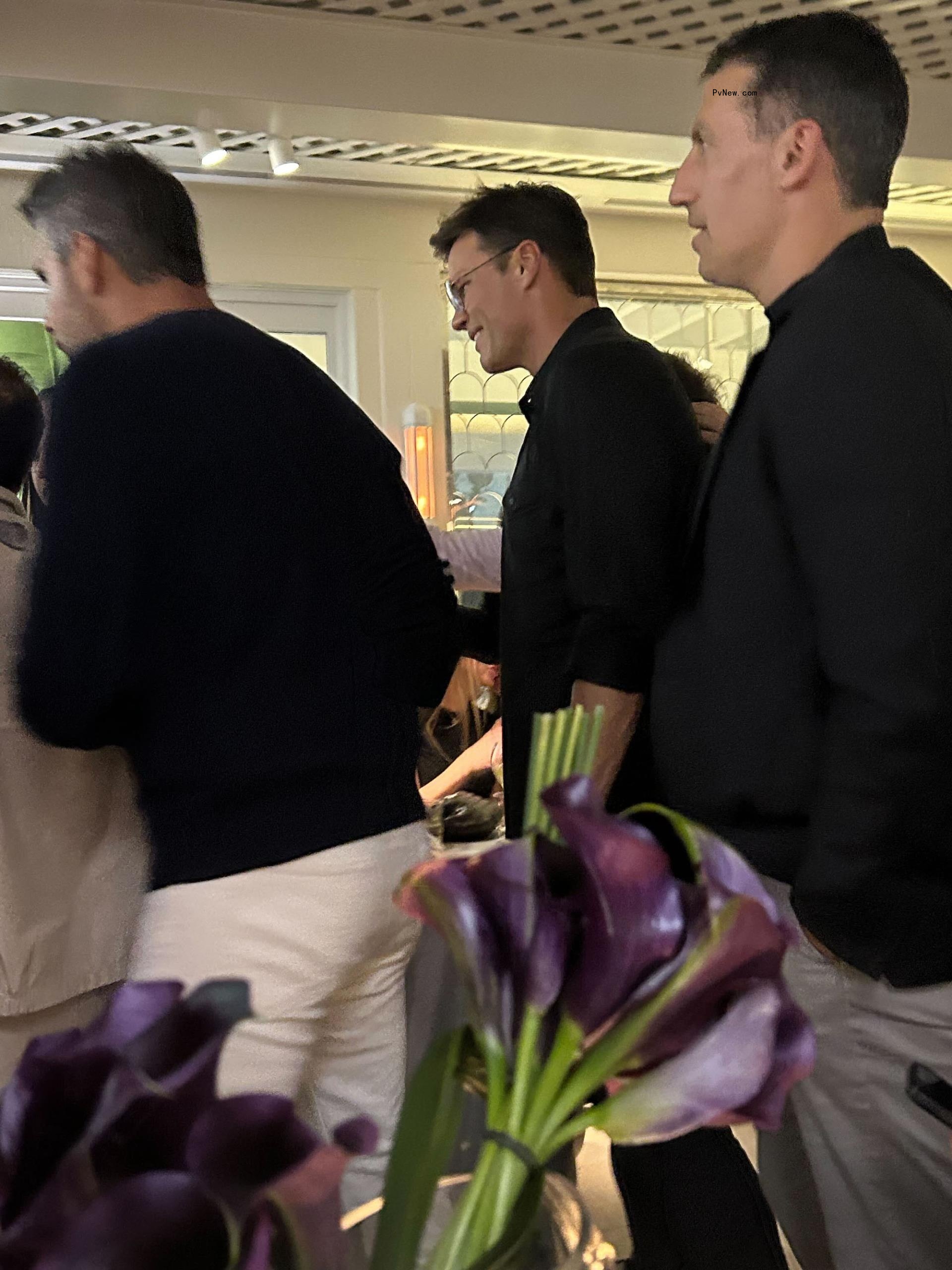 Tom Brady leaving a party.