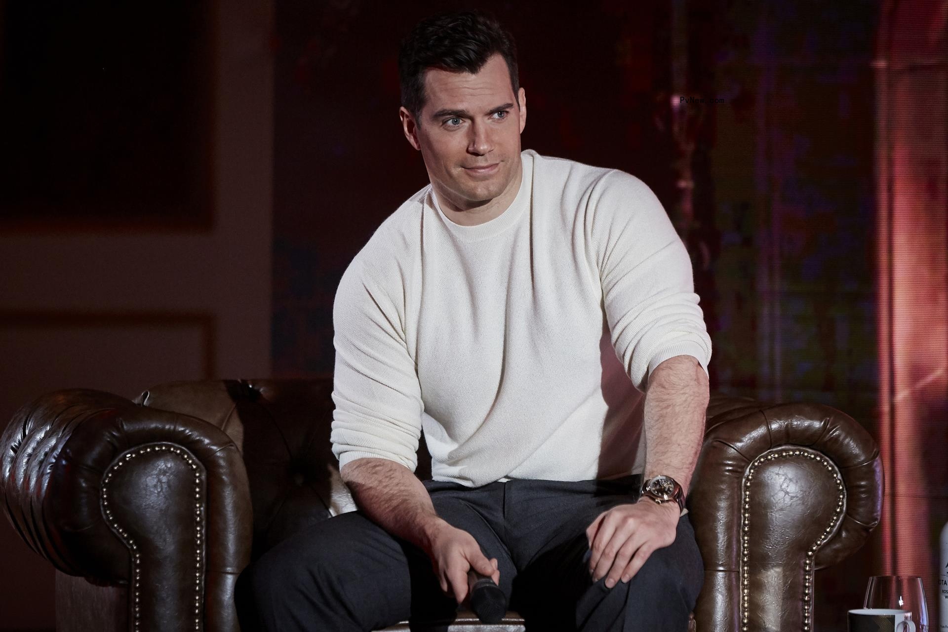 Henry Cavill sitting