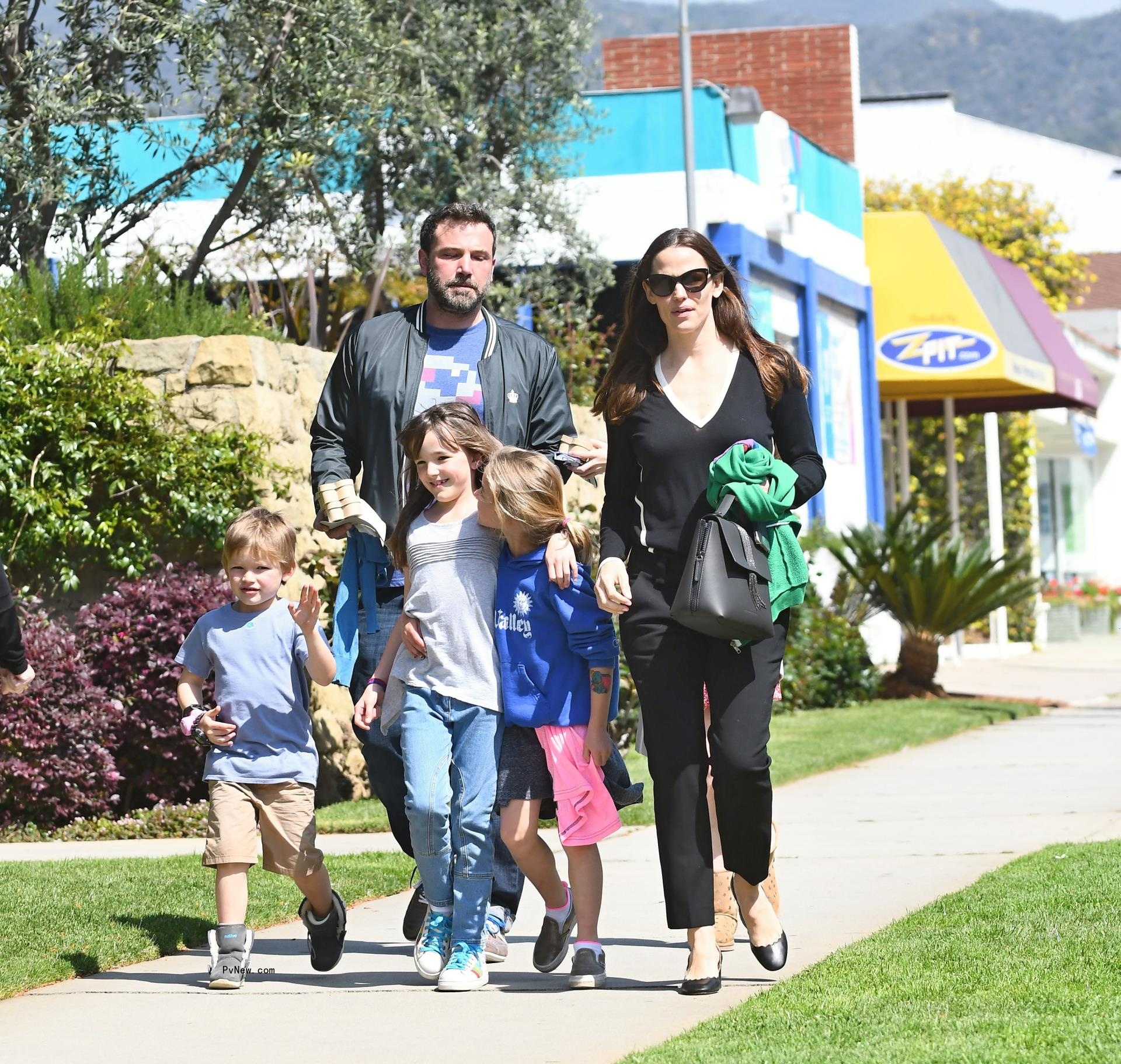 Ben Affleck and Jennifer Garner walking with their kids