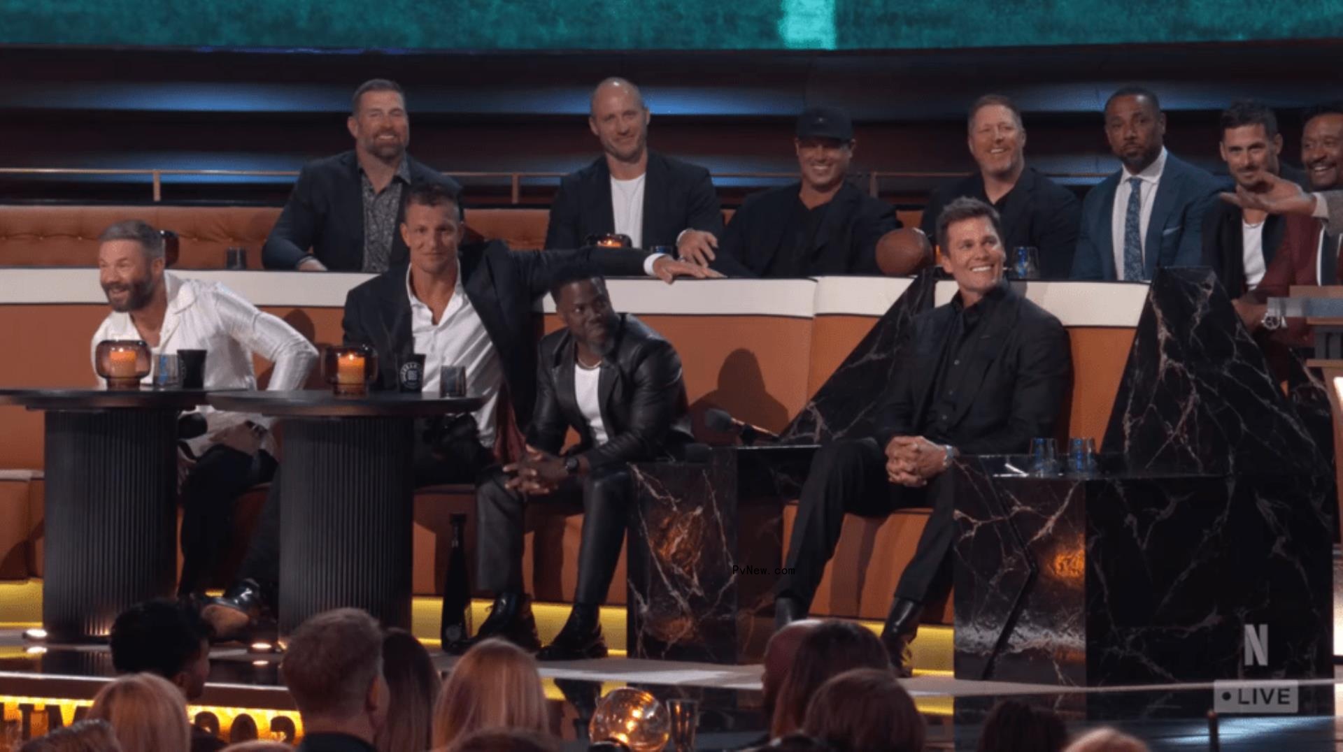 Tom Brady and Kevin Hart at the Roast of Tom Brady.