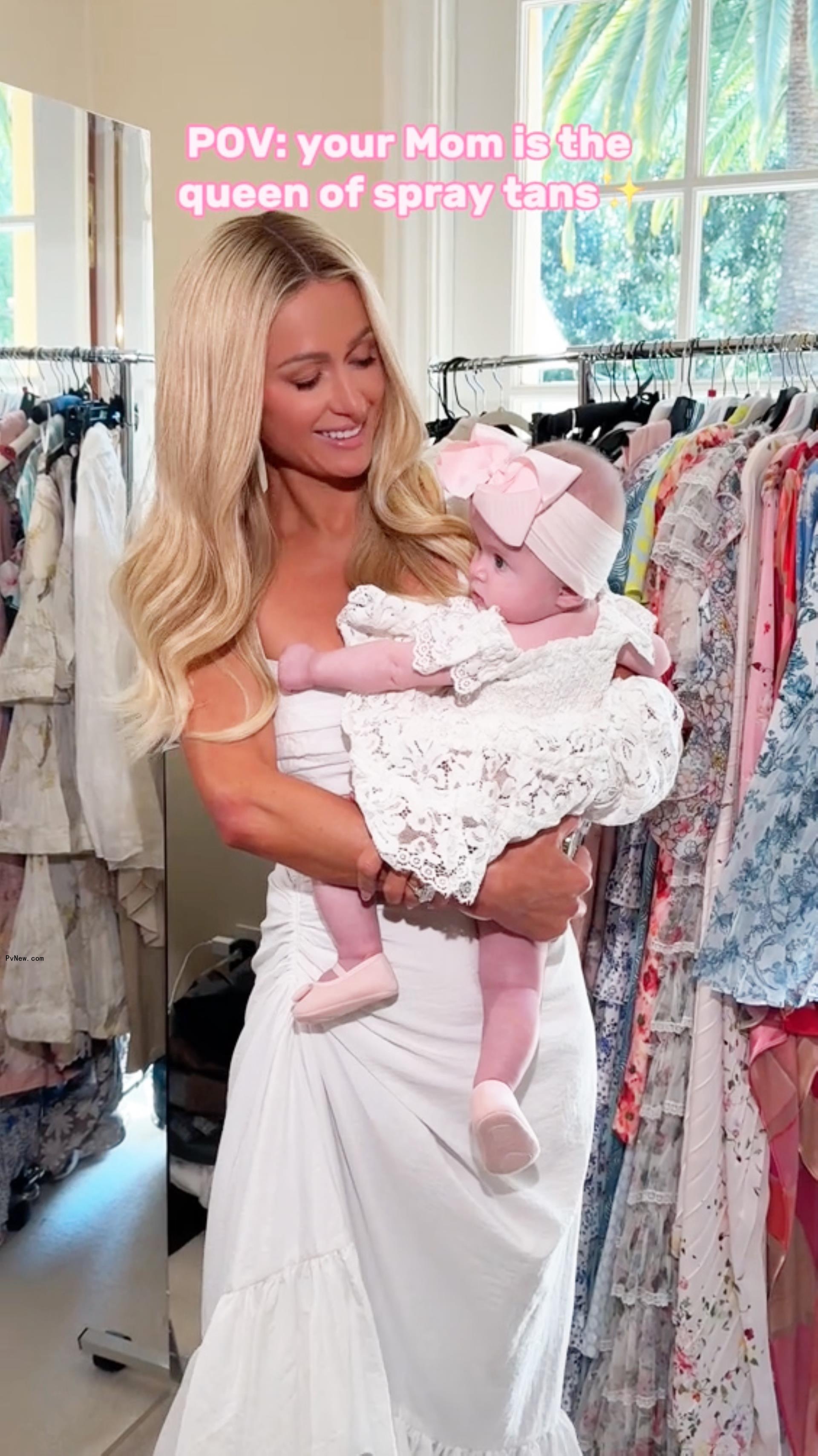 Paris Hilton holding her daughter.