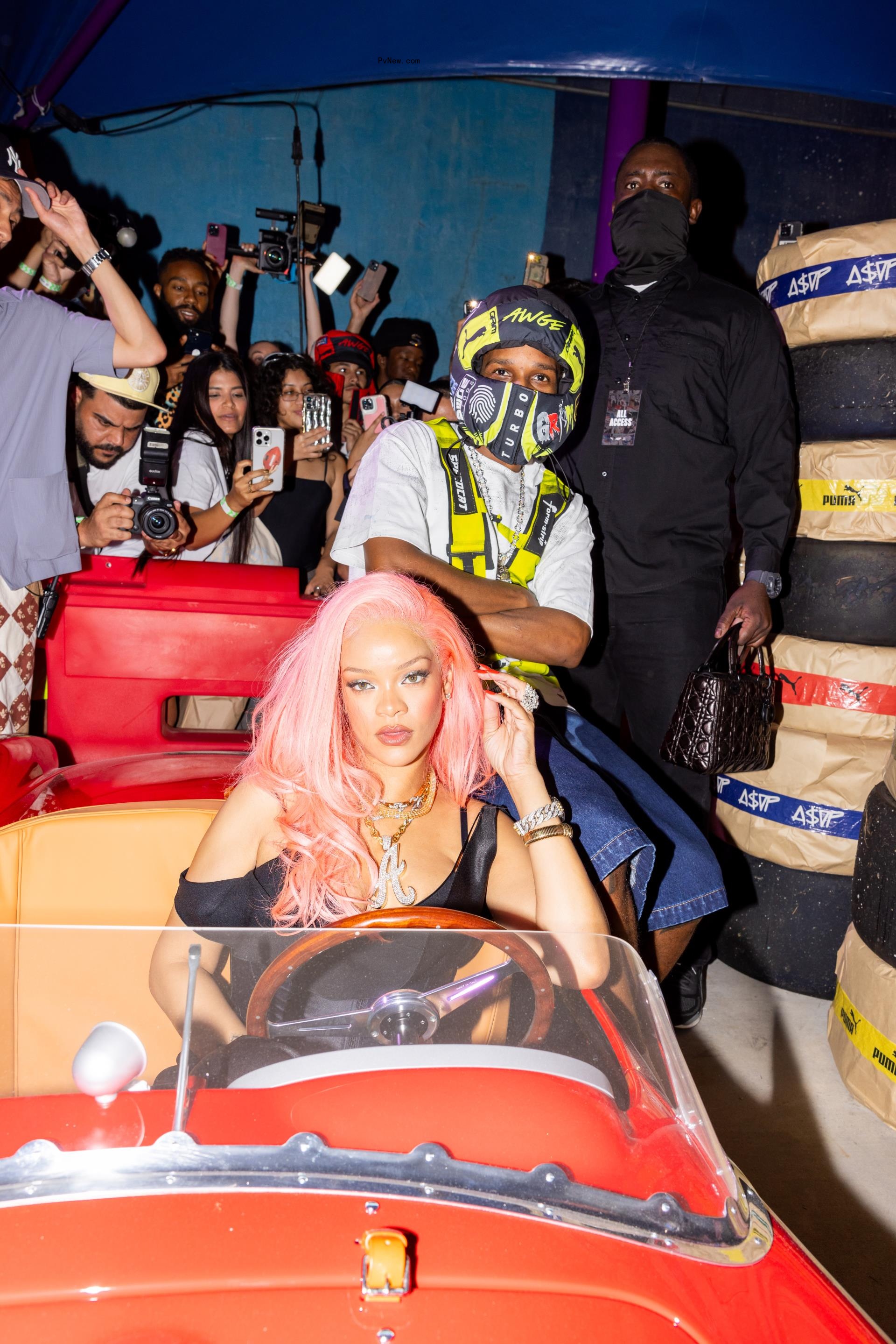 Rihanna with pink hair and A$AP Rocky in Miami at a Puma event.