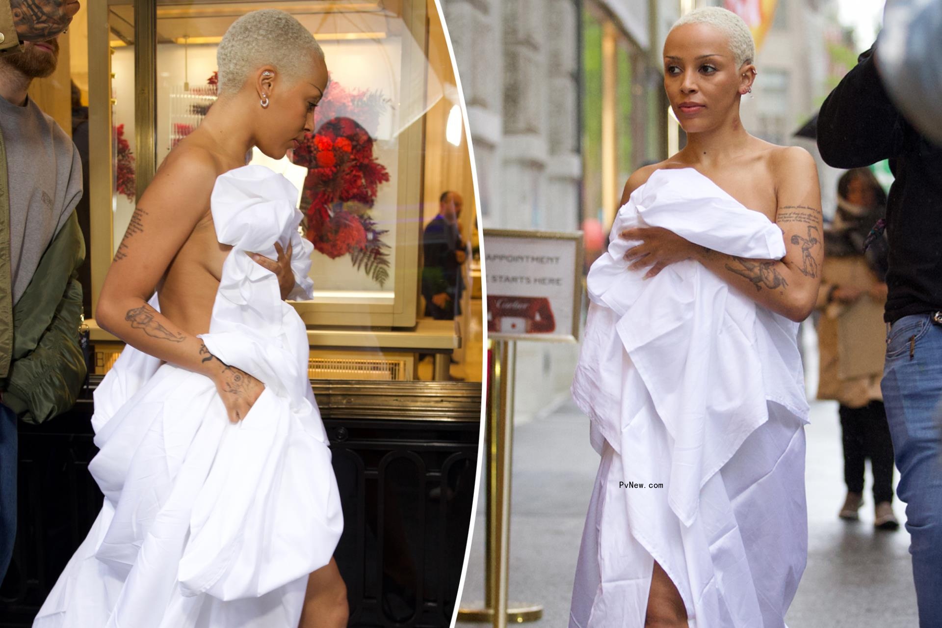 Doja Cat wears nothing but a bedsheet for pre-Met Gala outing: ‘What in the Bed Bath & Beyond is going on’