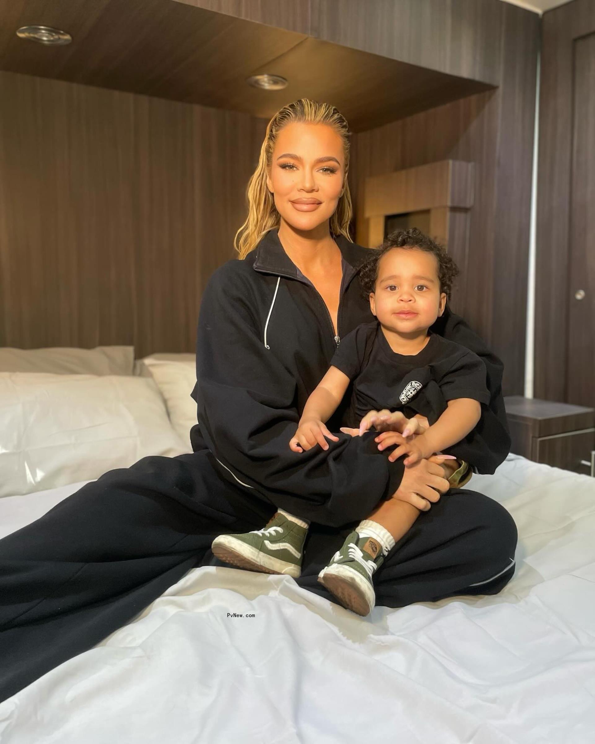Khloé Kardashian holding son Tatum