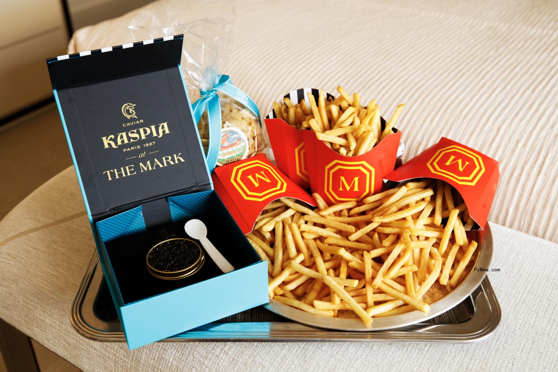 The Mark Hotel's Met Gala french fries with Caviar Kaspia caviar and potato chips on a platter. 