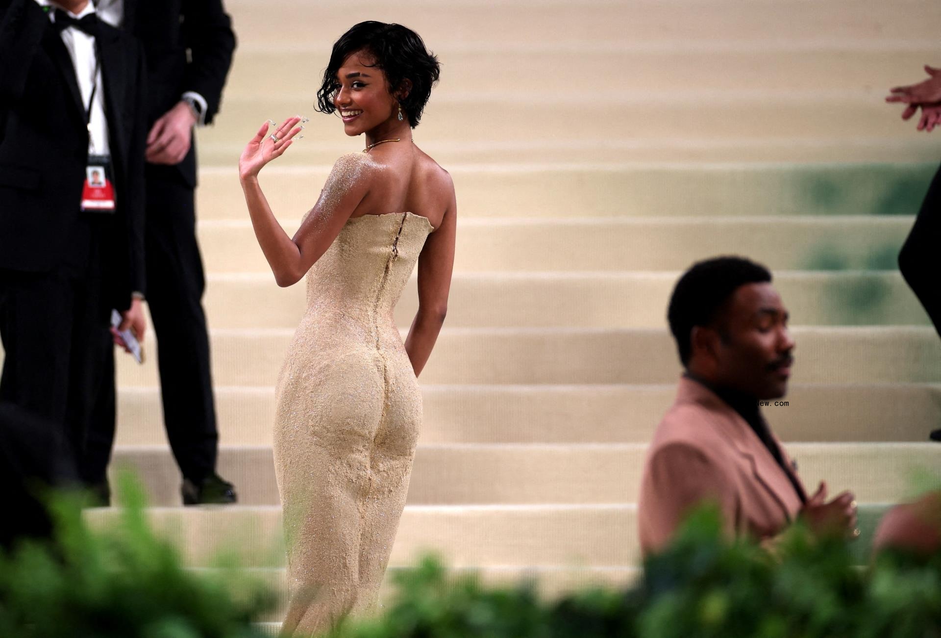 Tyla in a sand-covered gown