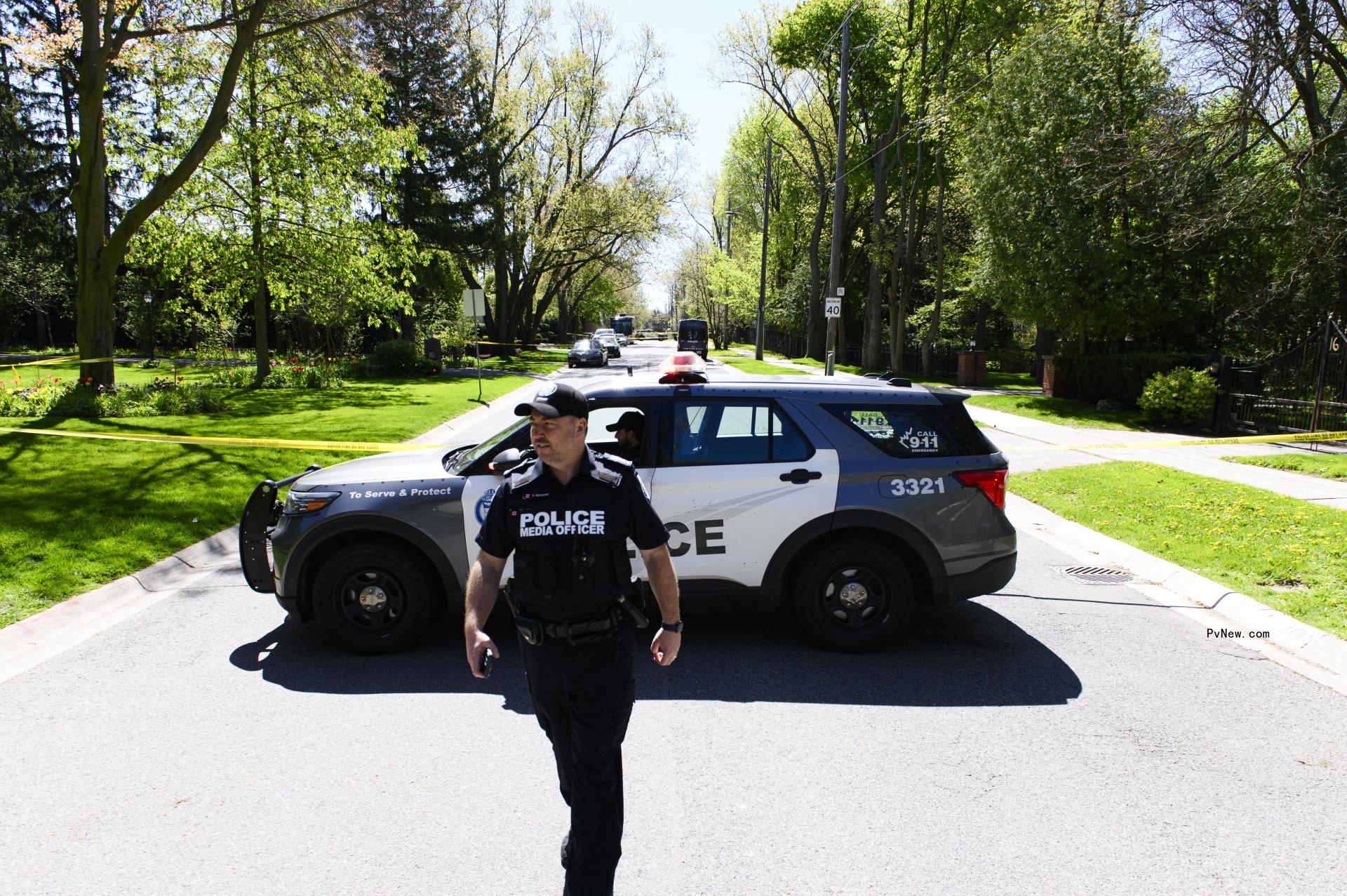 Police outside of Drake's home. 