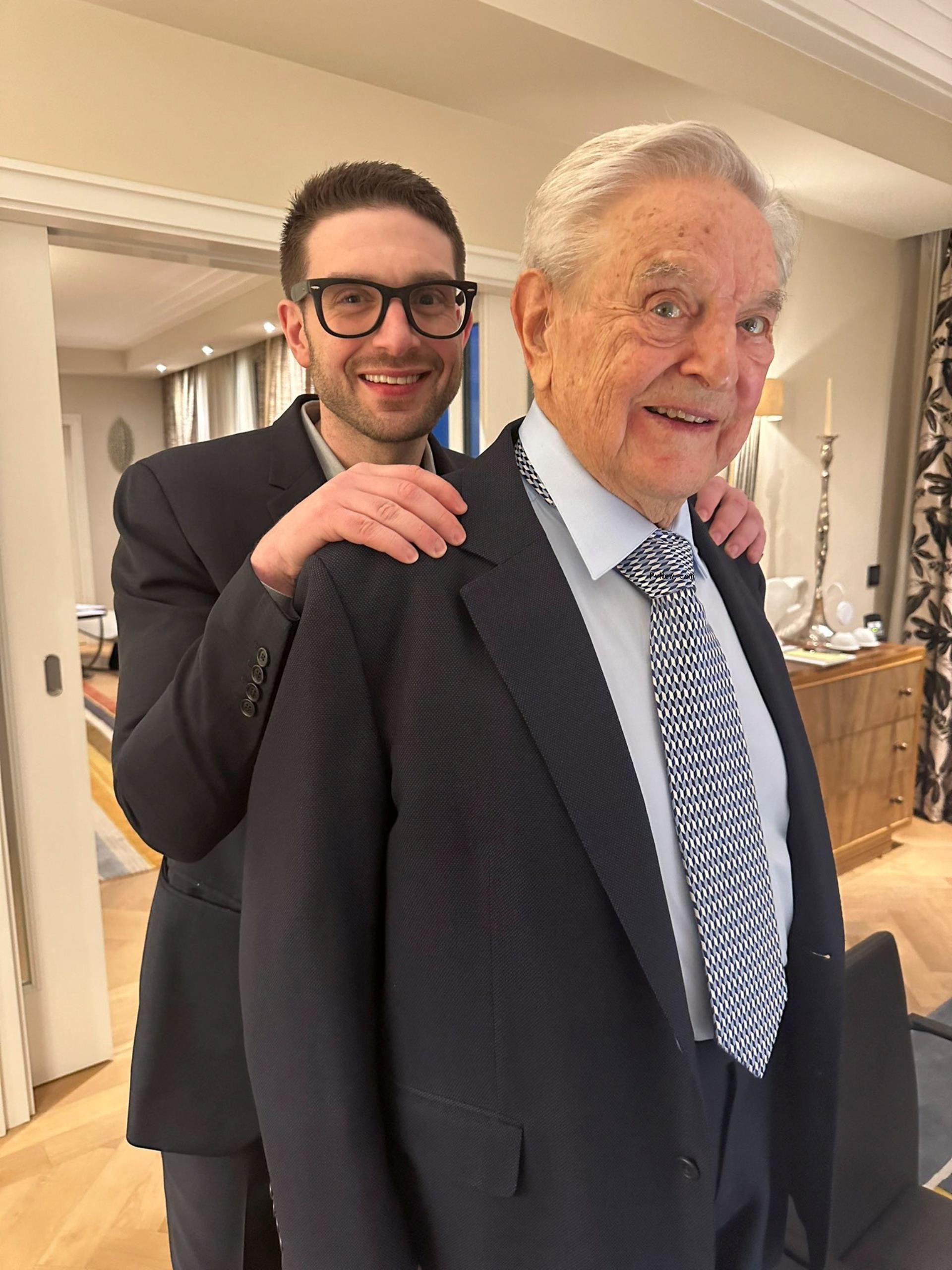 Alex Soros and George Soros.