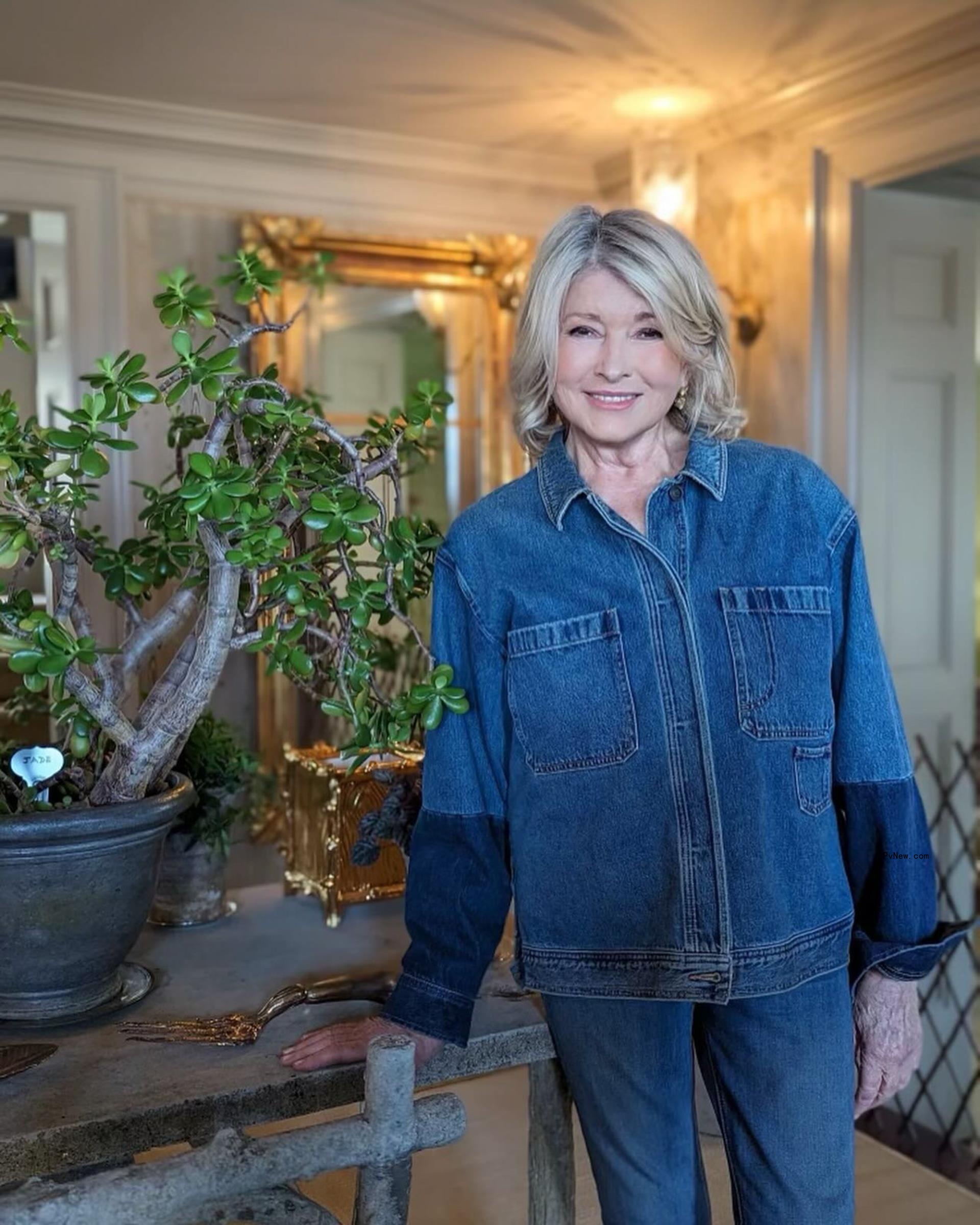 Martha Stewart in a denim jumpsuit.
