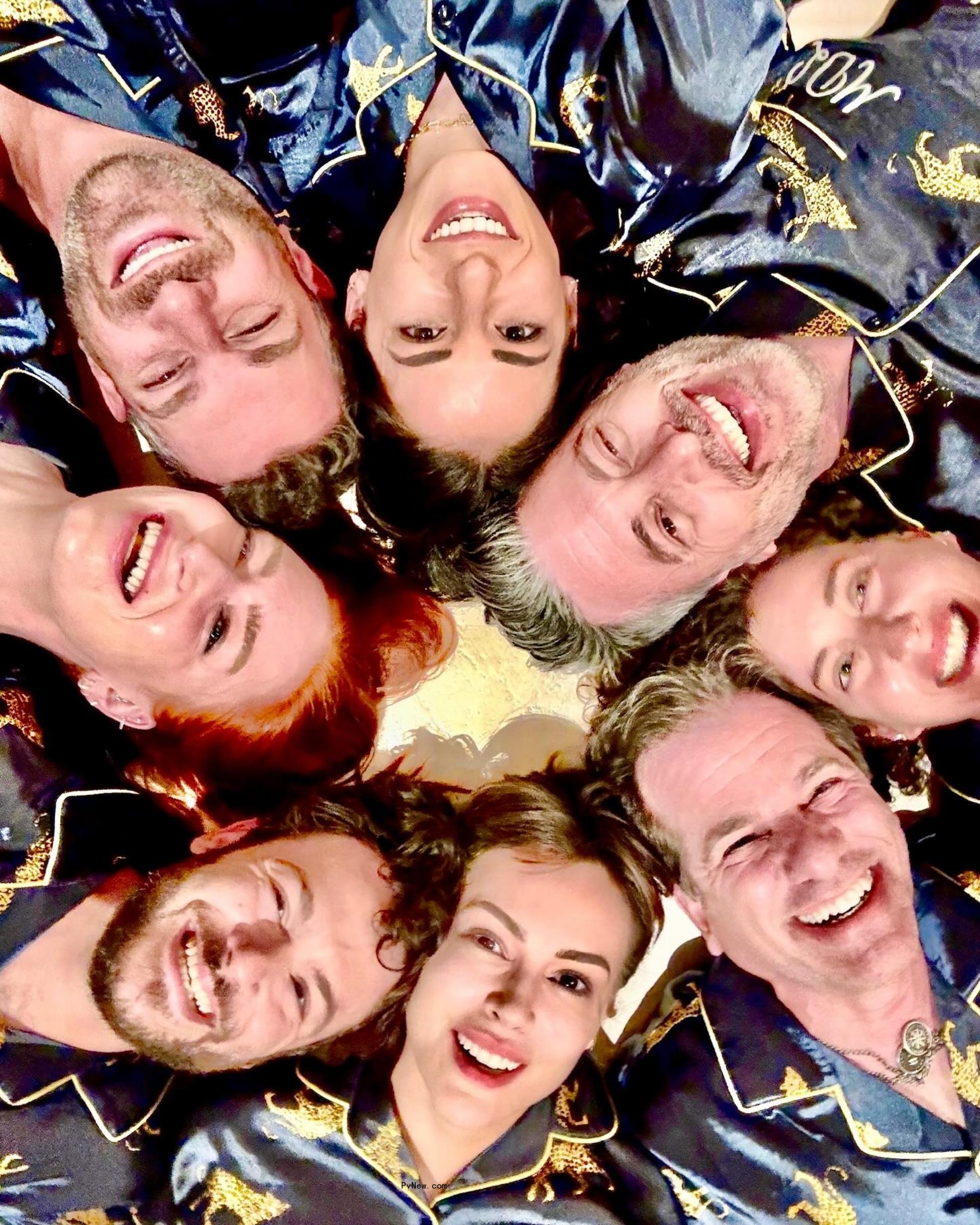 Alyssa Milano, David Bugliari, and their friends in matching pajamas. 