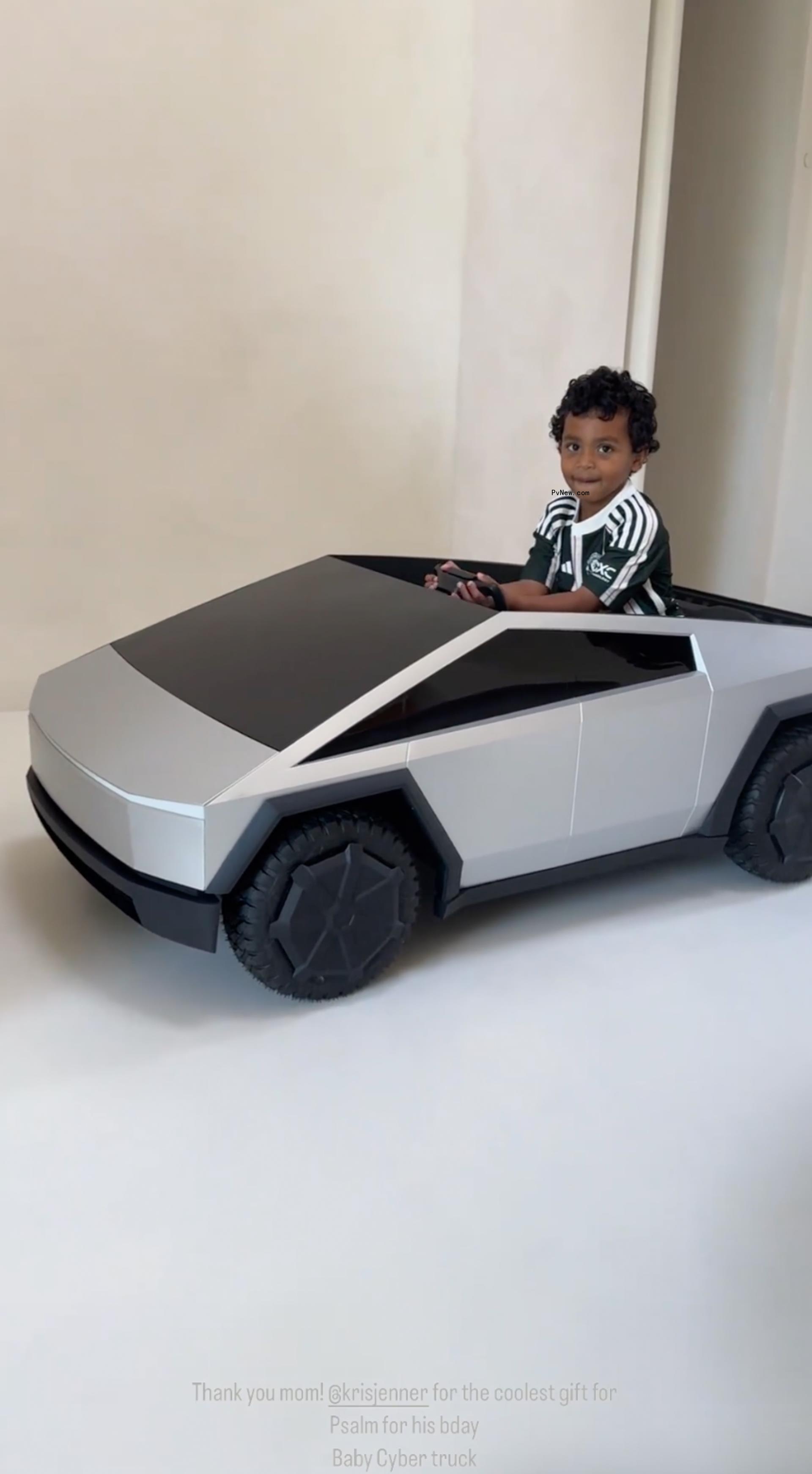 Psalm West in a tesla cybertruck.