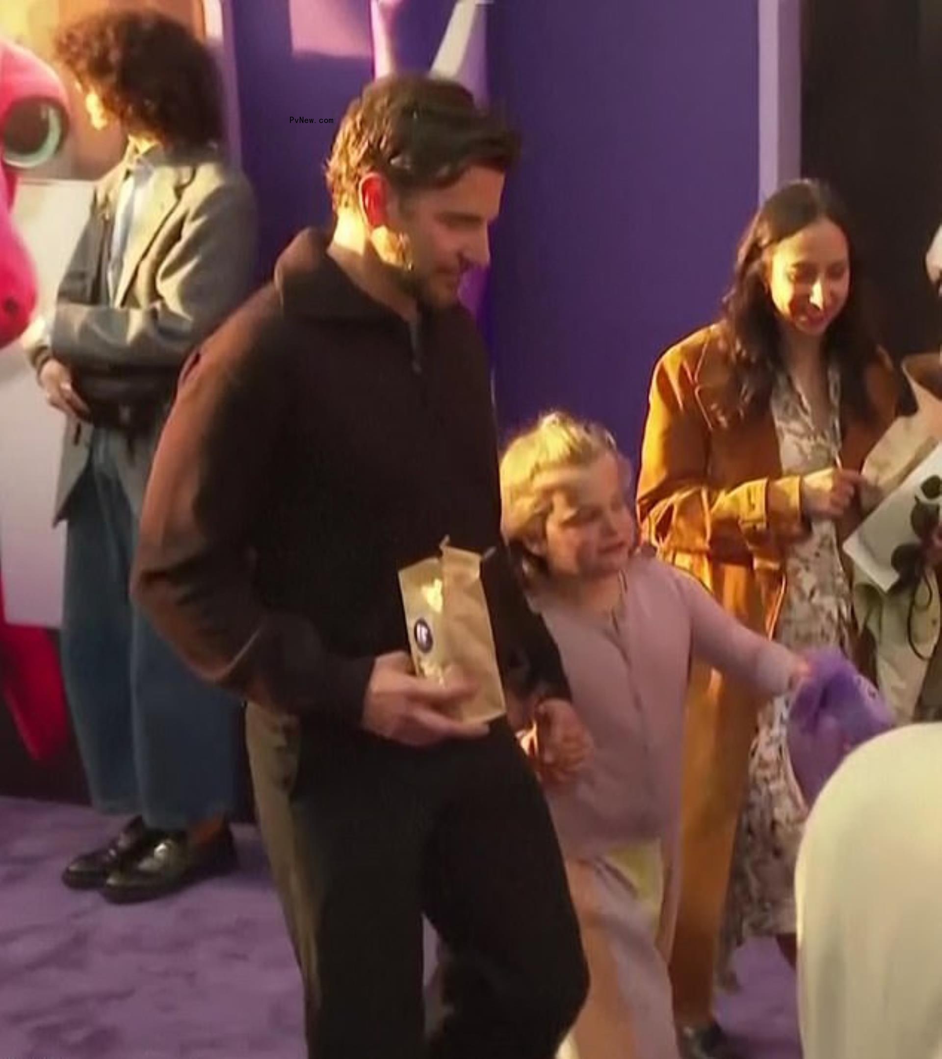 Bradley Cooper and daughter Lea walk the red carpet at the 