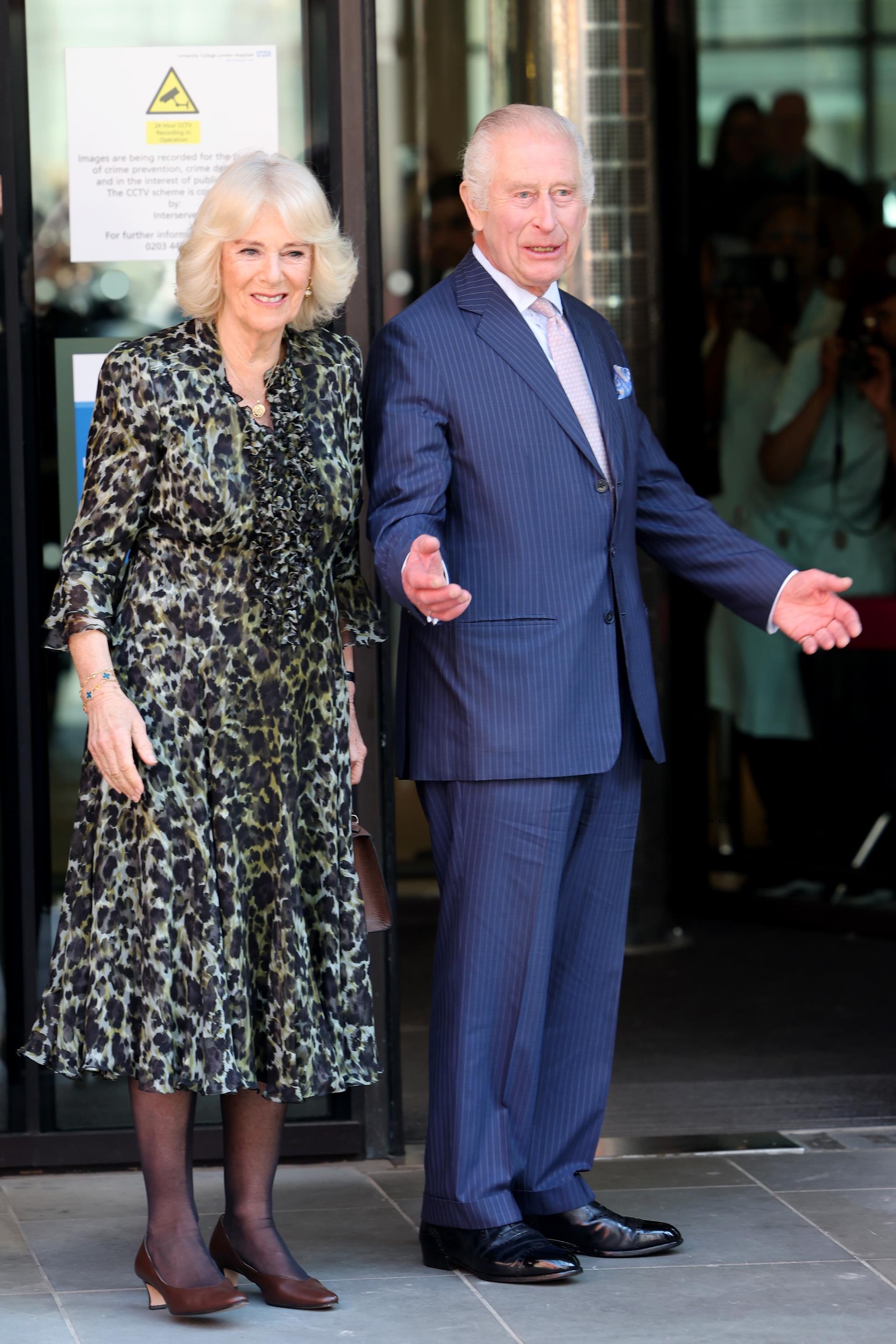 King Charles and Prince William walking together 