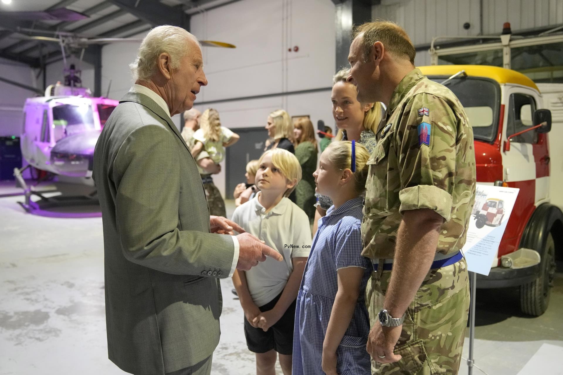 King CHarles talking with military members
