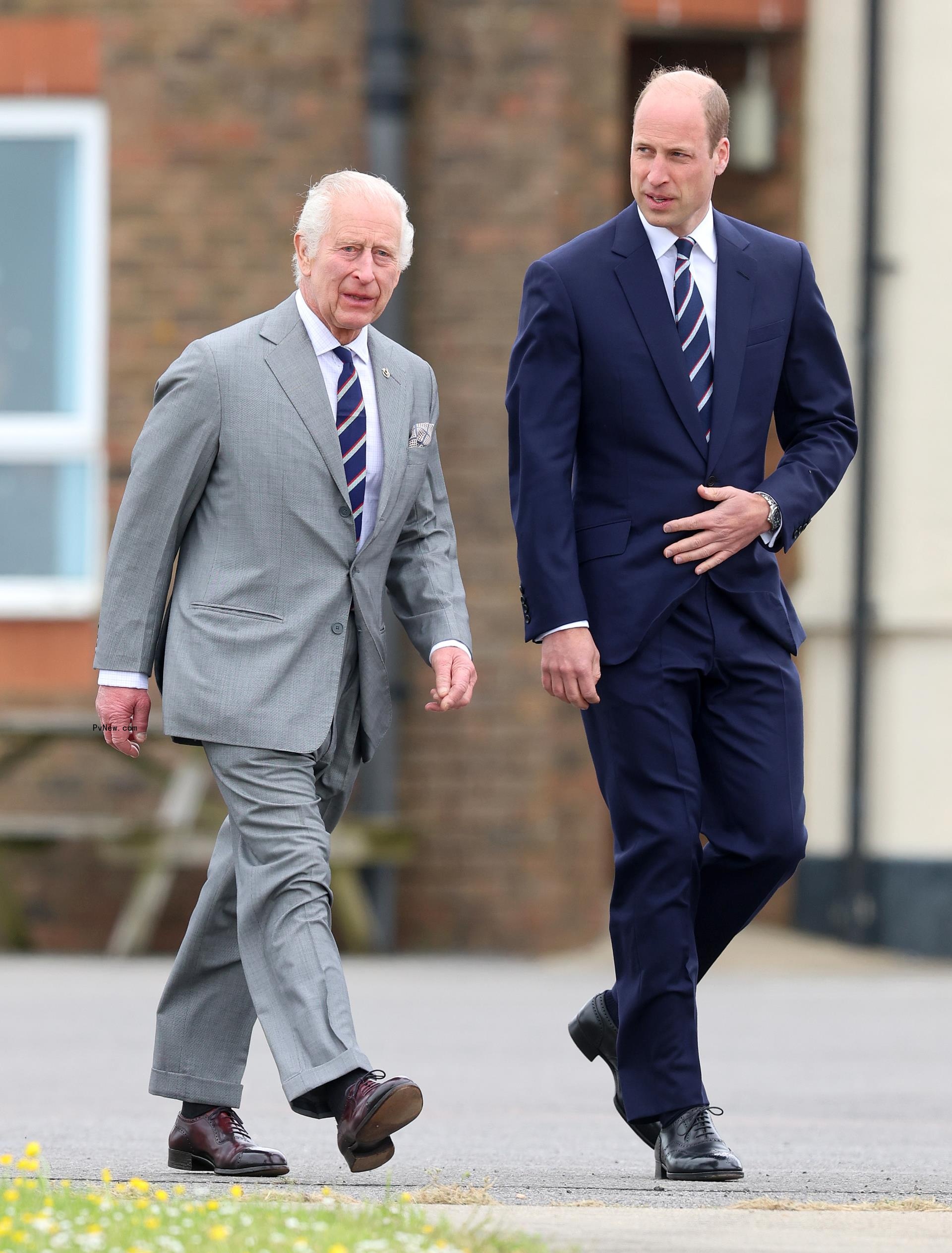 King Charles and Prince William walking 