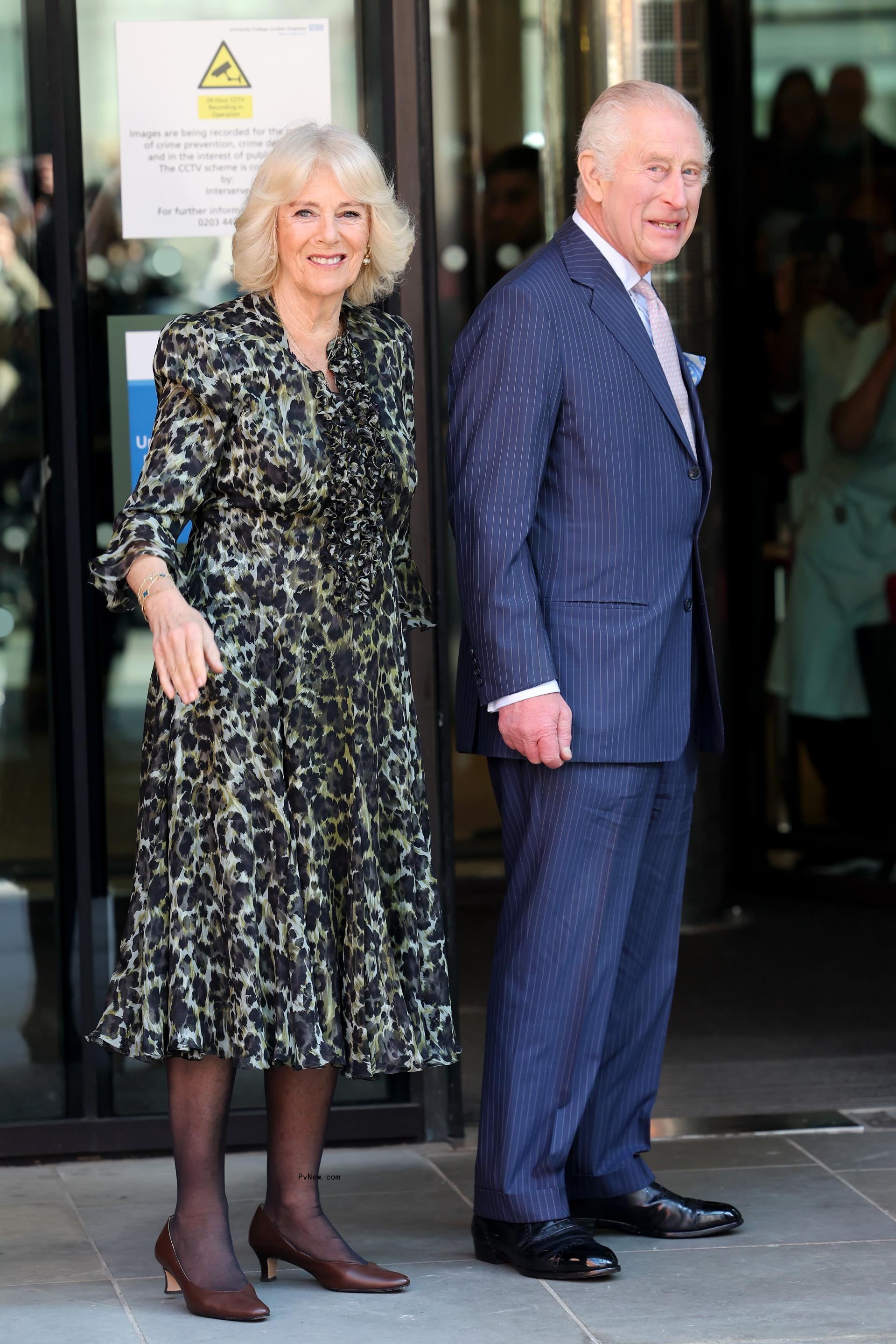 Queen Camilla and King Charles III walking together 