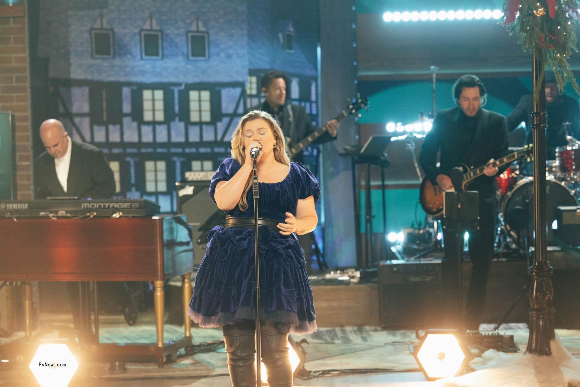 Kelly Clarkson performing on stage. 