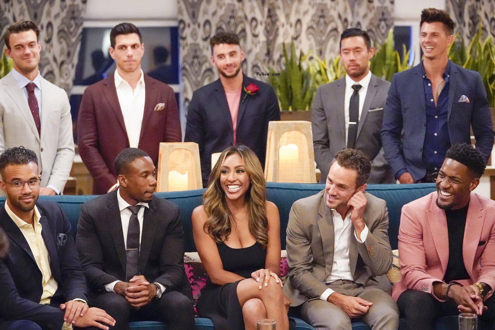 Tayshia Adams and the cast of 