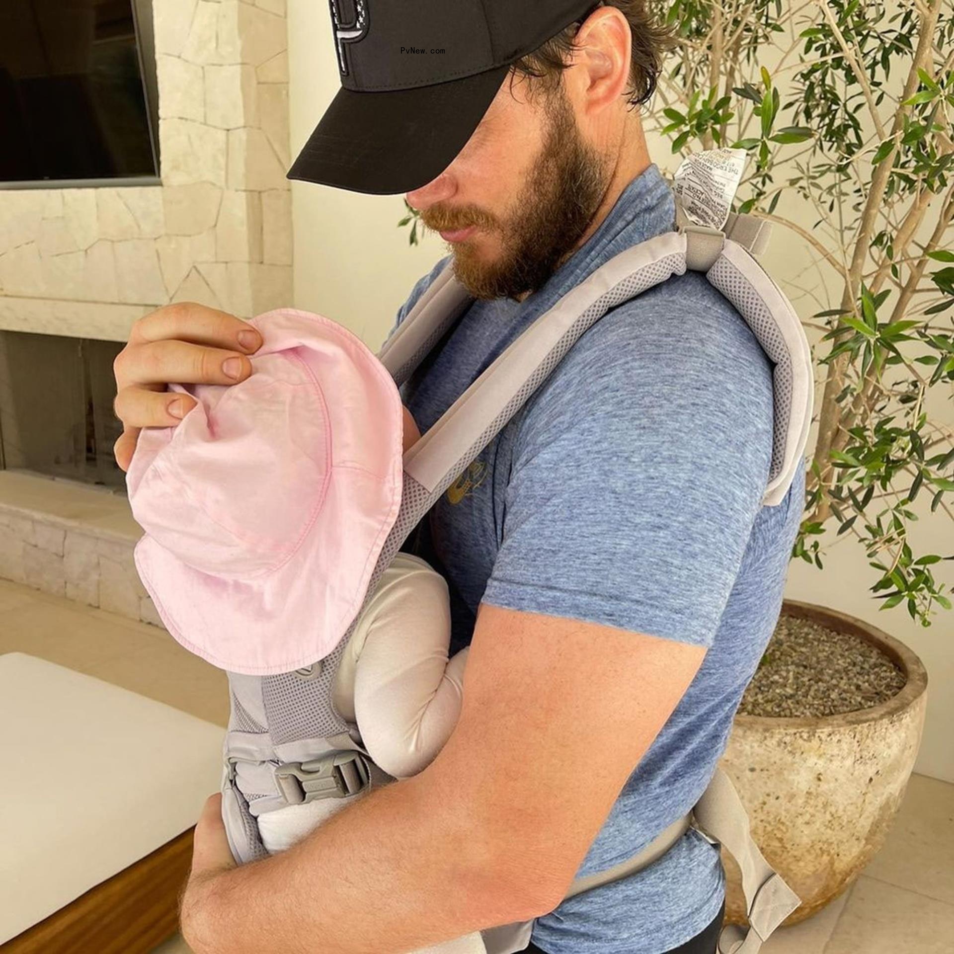 Chris Pratt holding his daughter. 