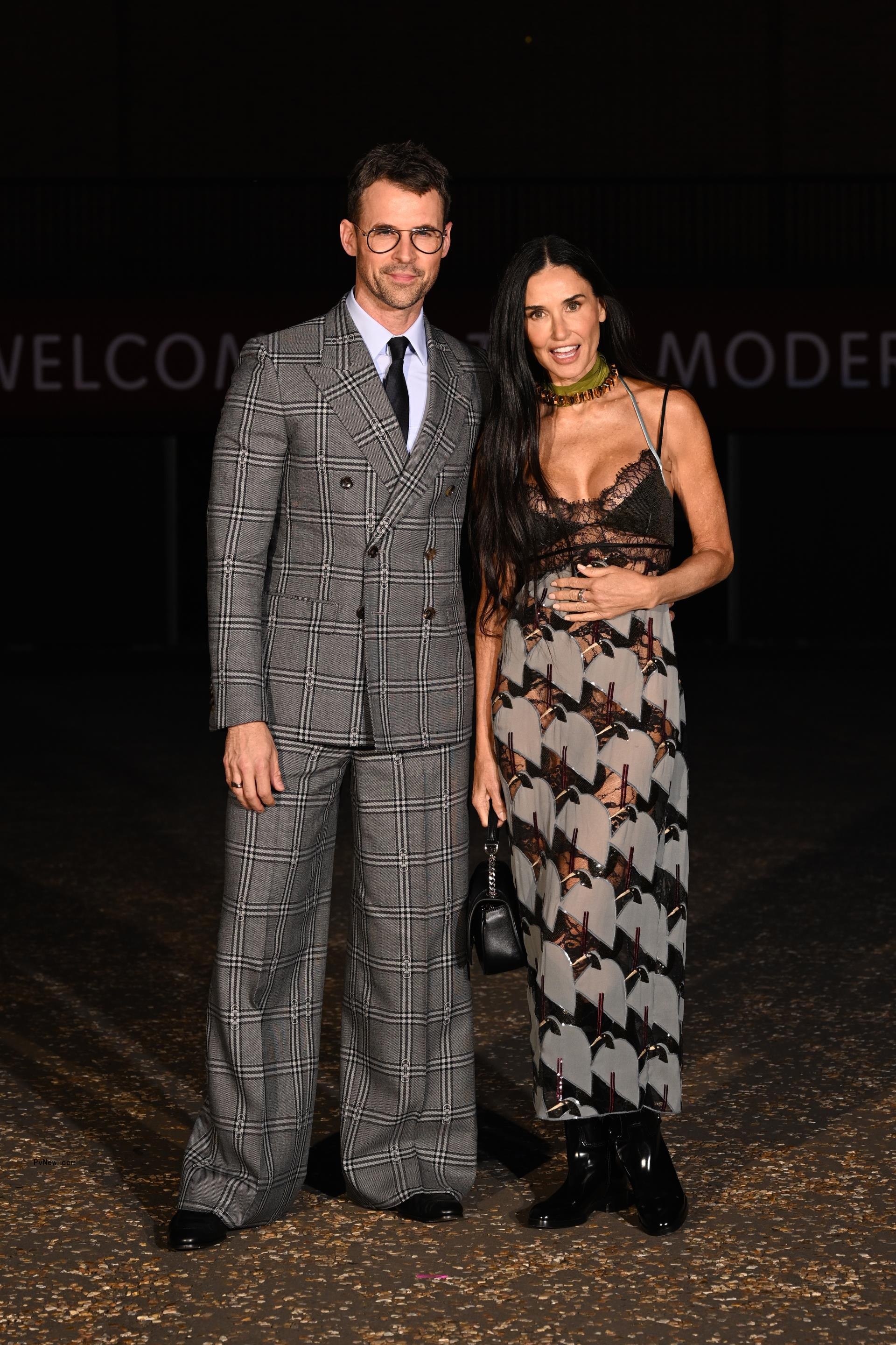 Brad Goreski and Demi Moore at the Gucci Cruise 2025 fashion show