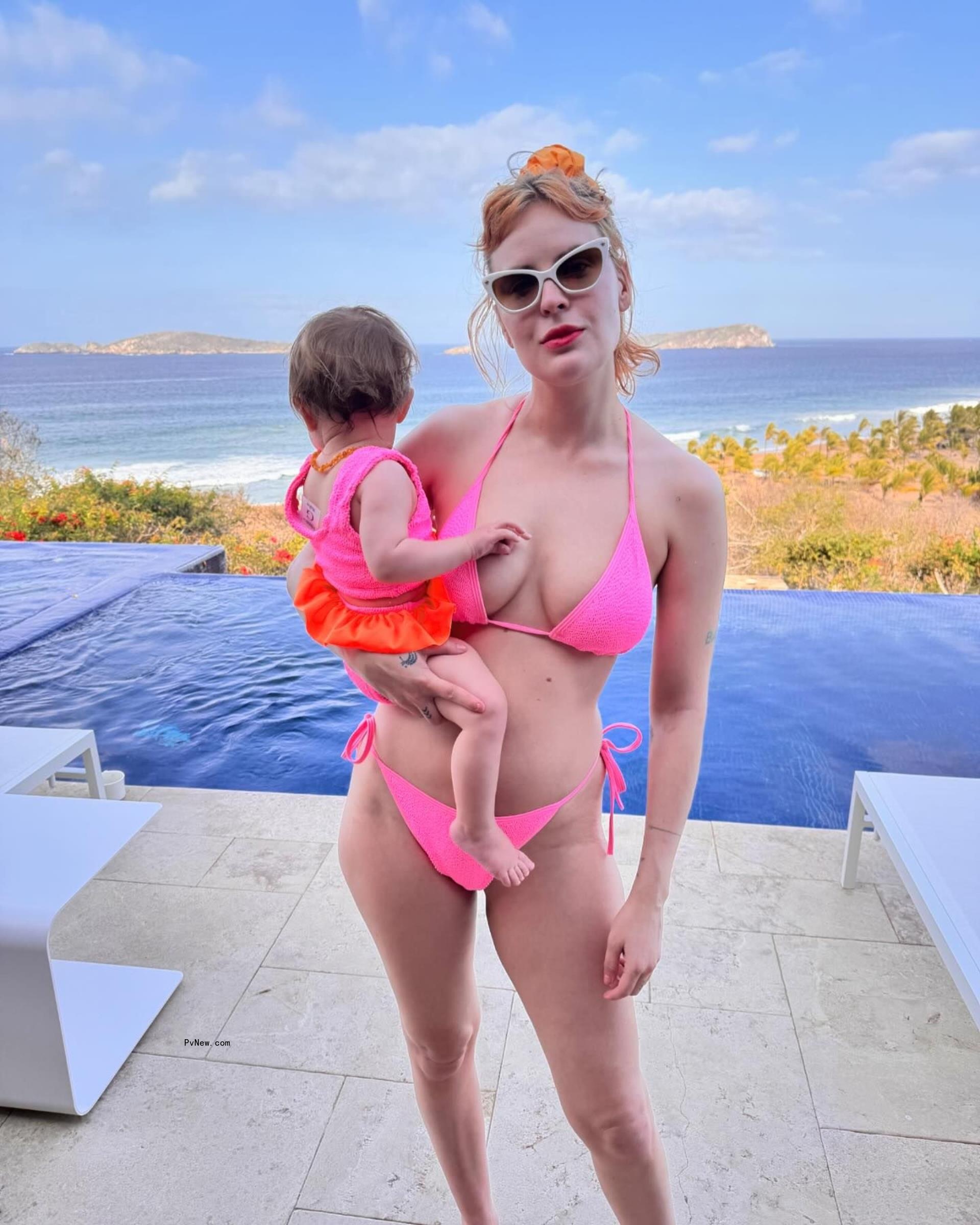 Rumer Willis holding her daughter Louetta. 