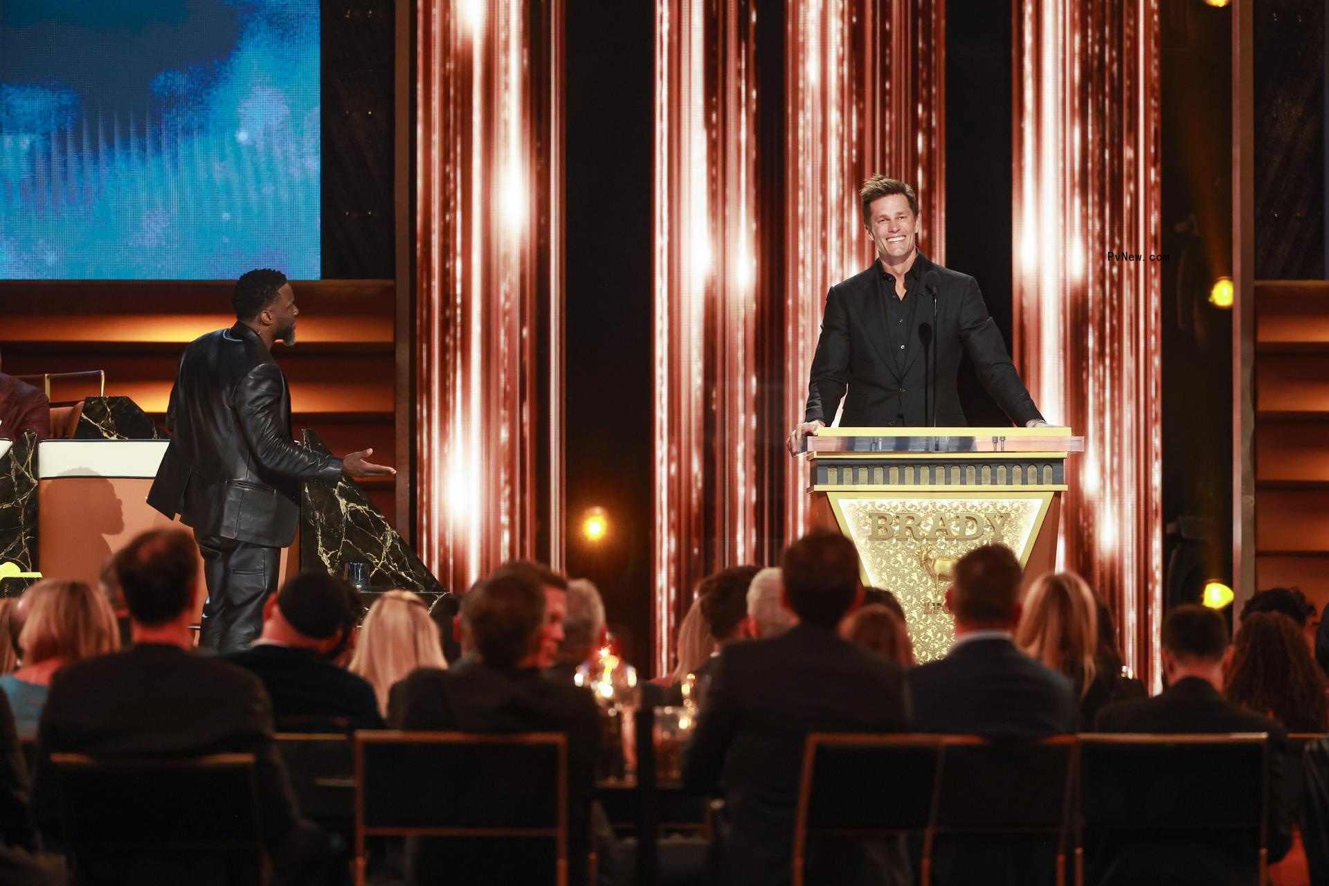 Kevin Hart and Tom Brady at Brady's roast.