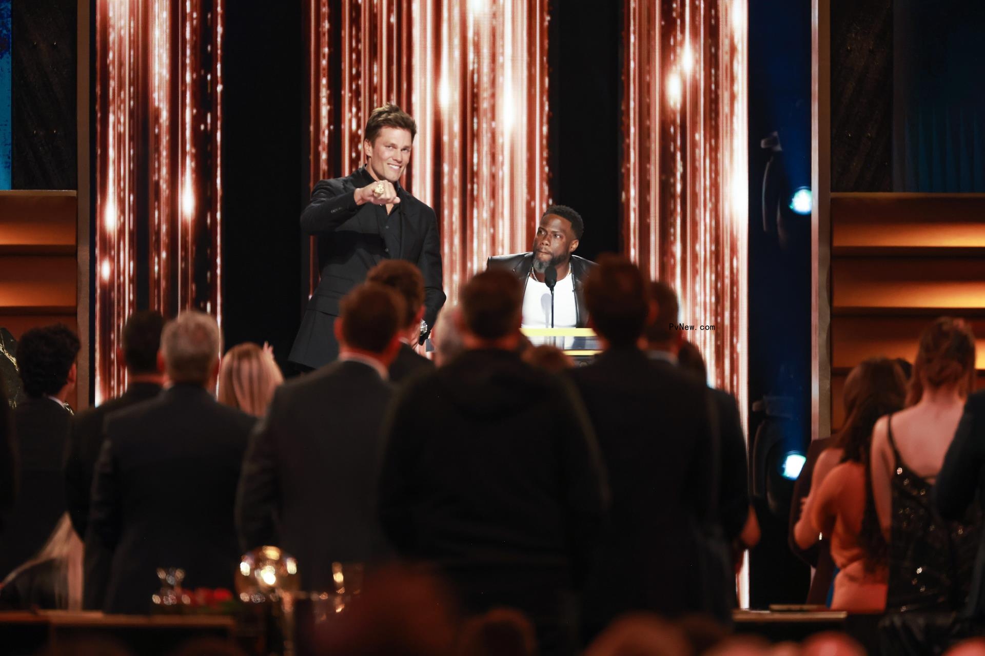 Kevin Hart and Tom Brady at Brady's roast.