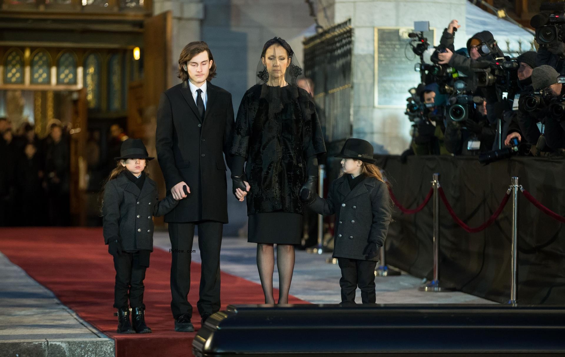 Céline Dion poses with sons 