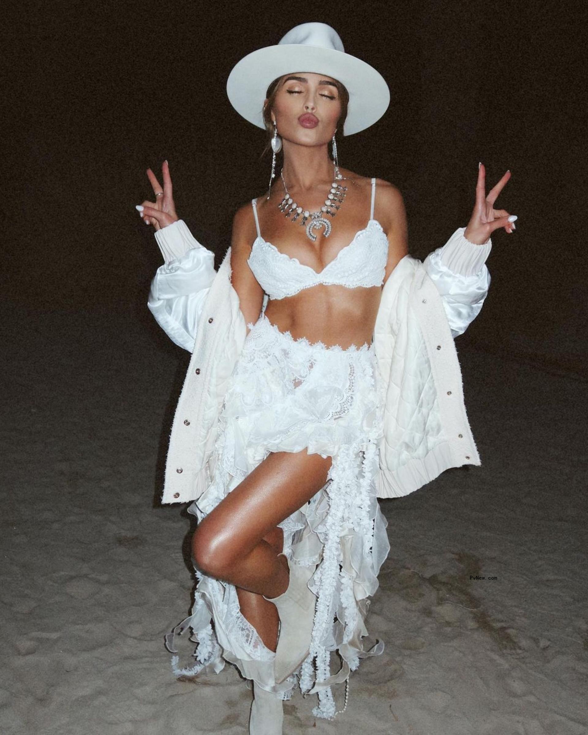 Olivia Culpo in a white dress.