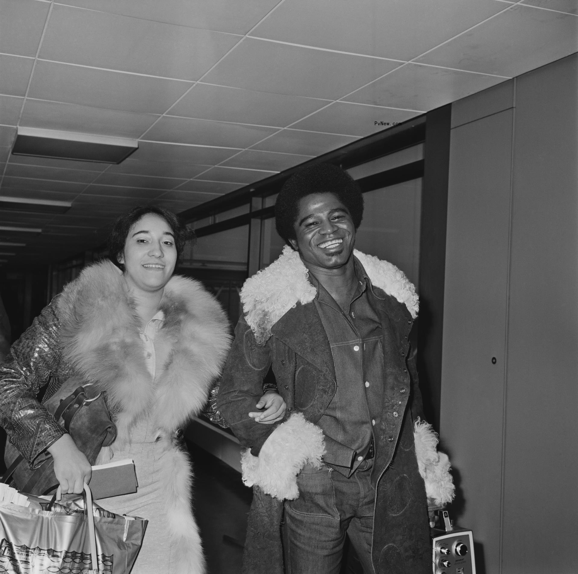 A black-and-white photo of James Brown and Deidre Jenkins.