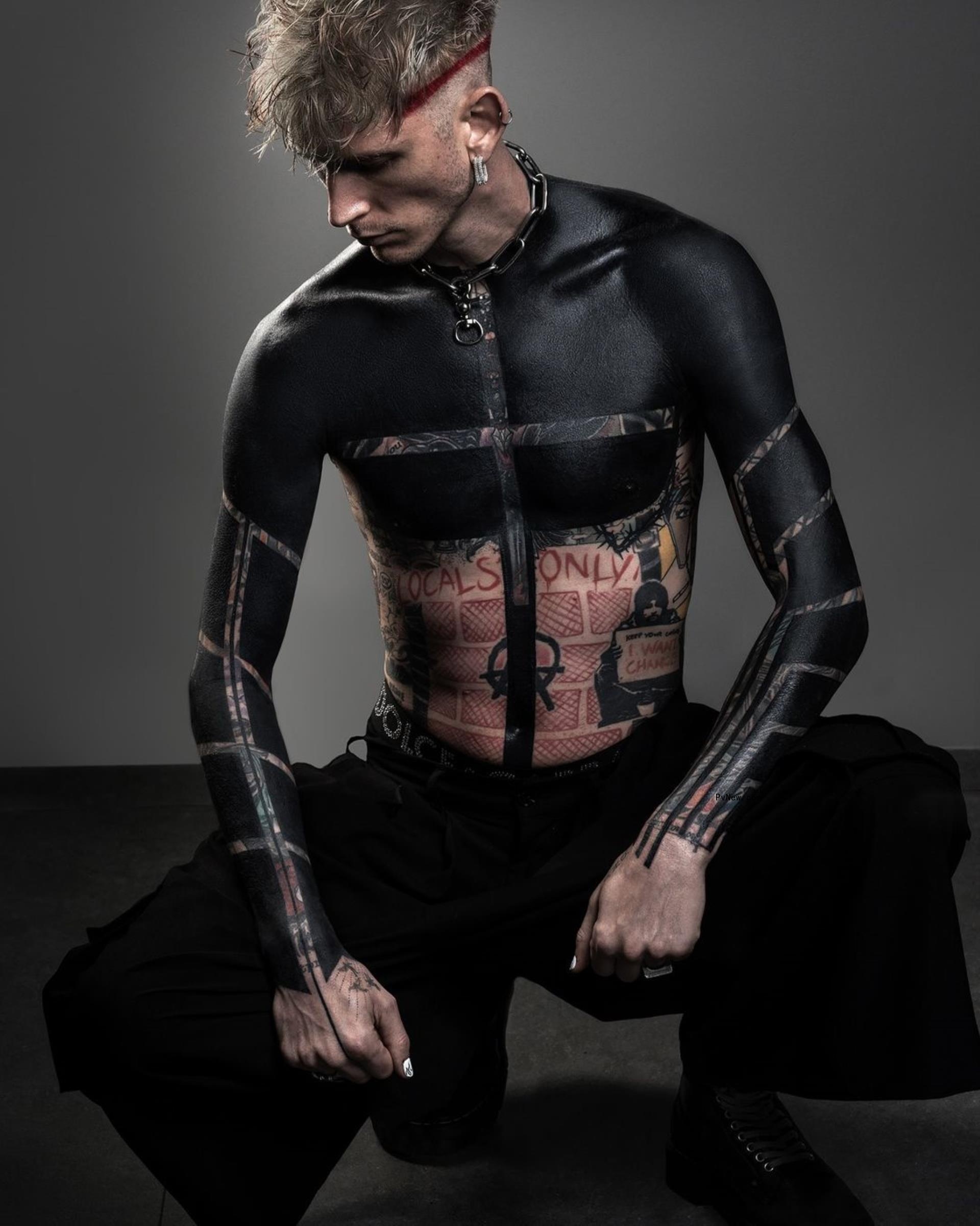 Machine Gun Kelly blackout tattoos