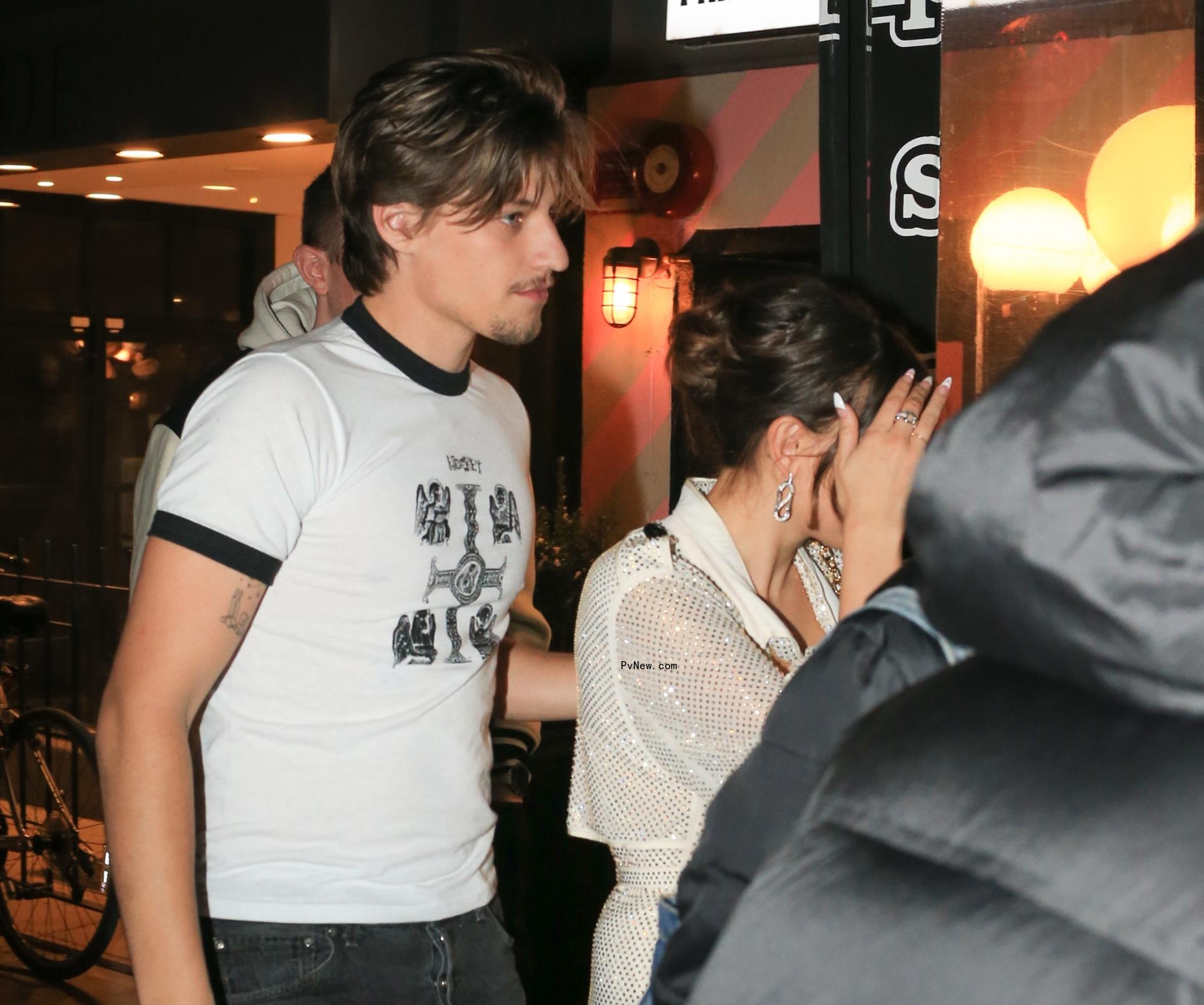 Millie Bobby Brown and Jake Bo<i></i>ngiovi celebrating her birthday.