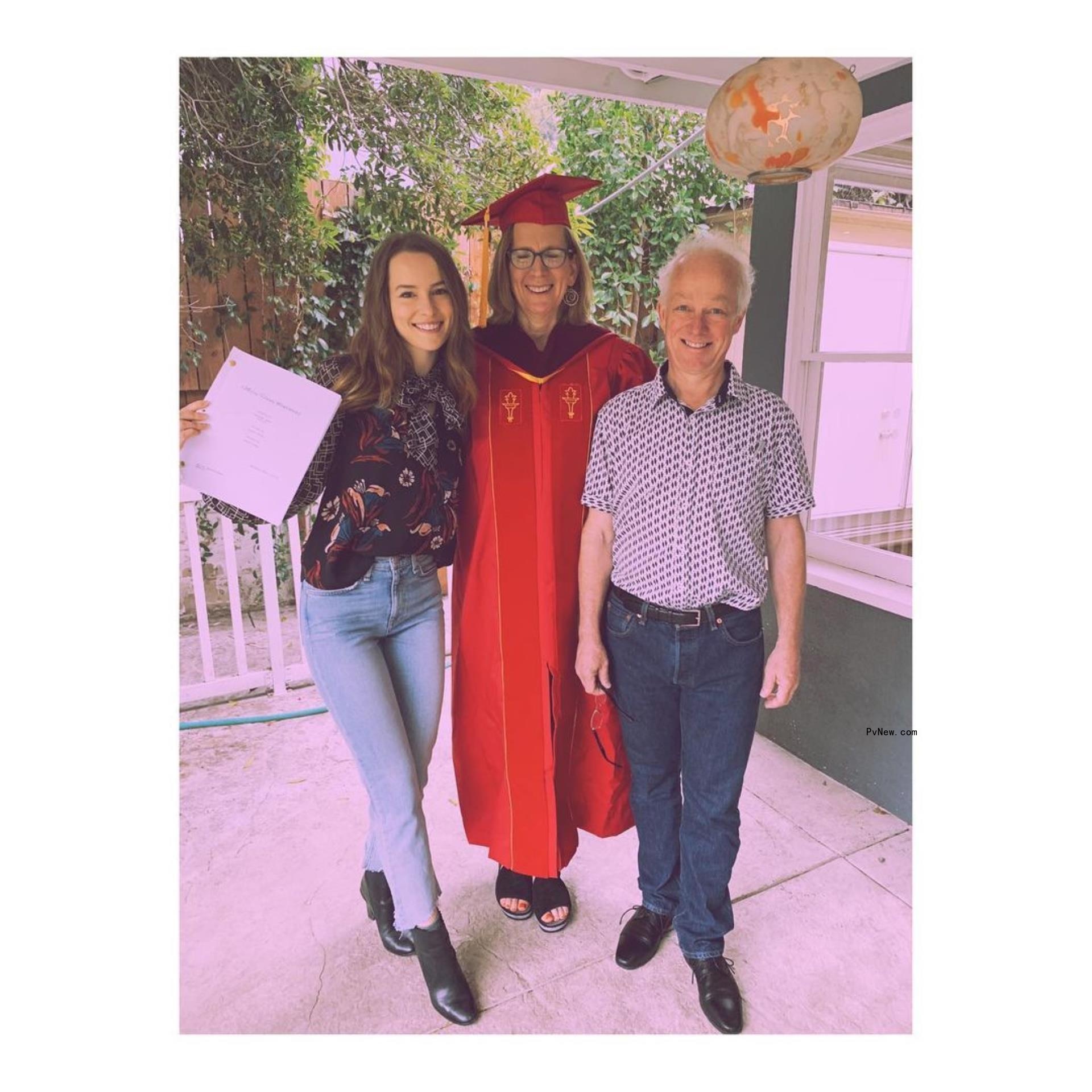 Bridgit Mendler with someone in a grad gown.
