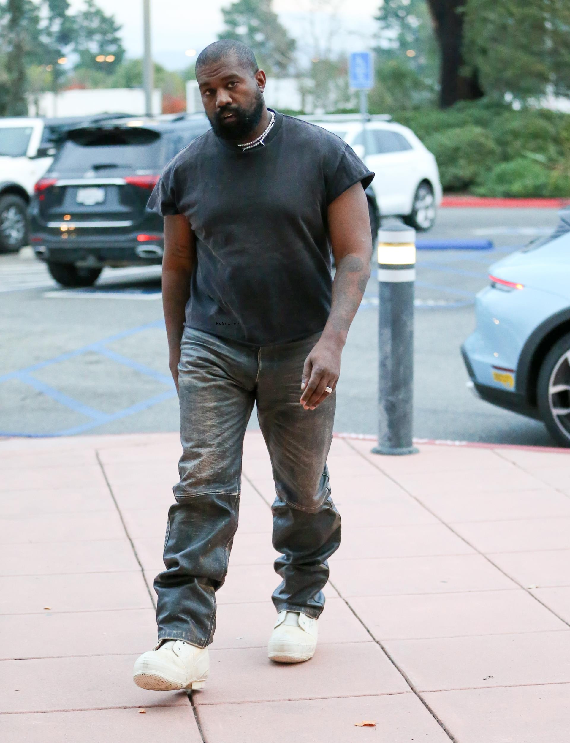 Kanye West walking in LA.