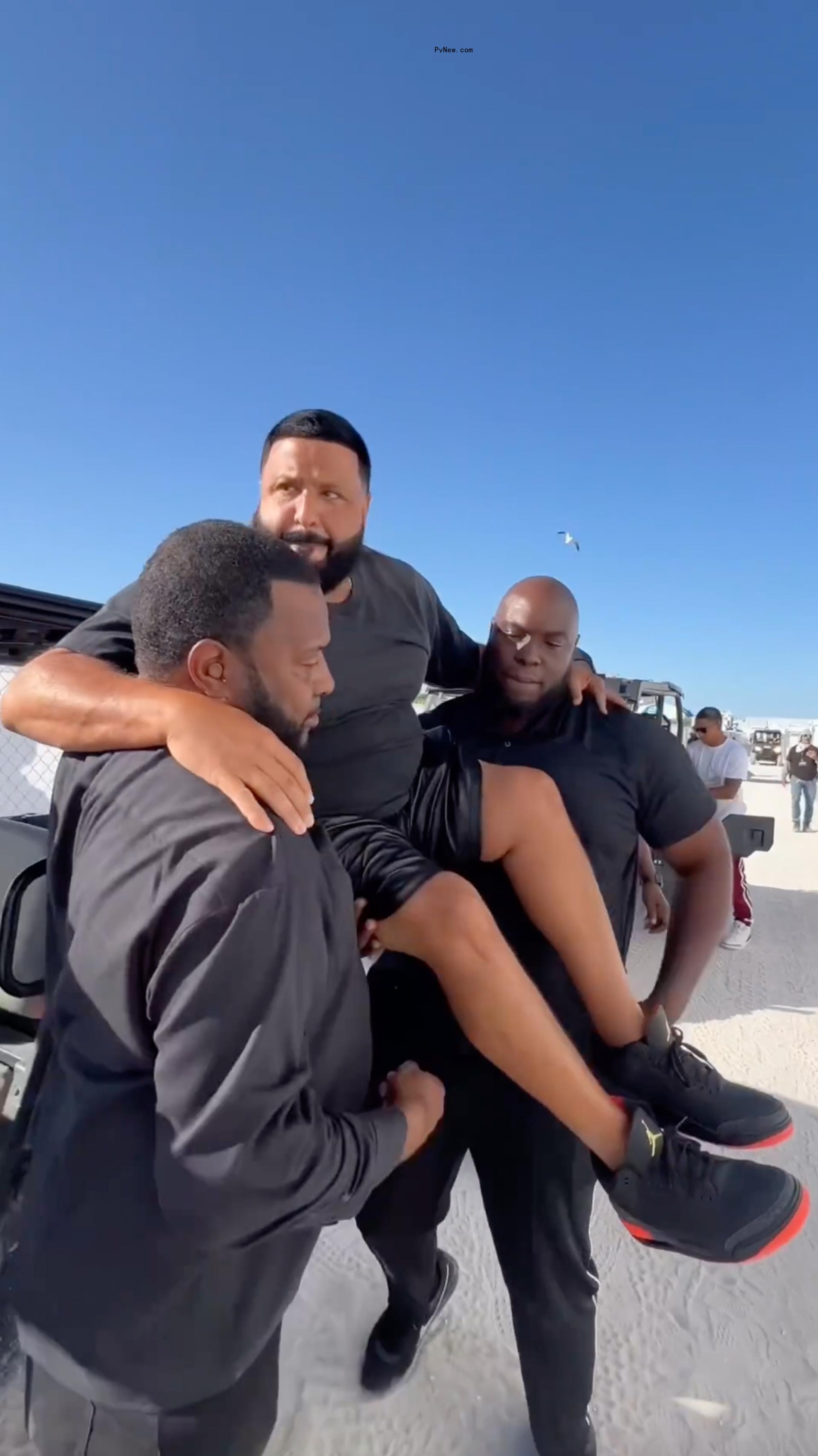 DJ Khaled being carried