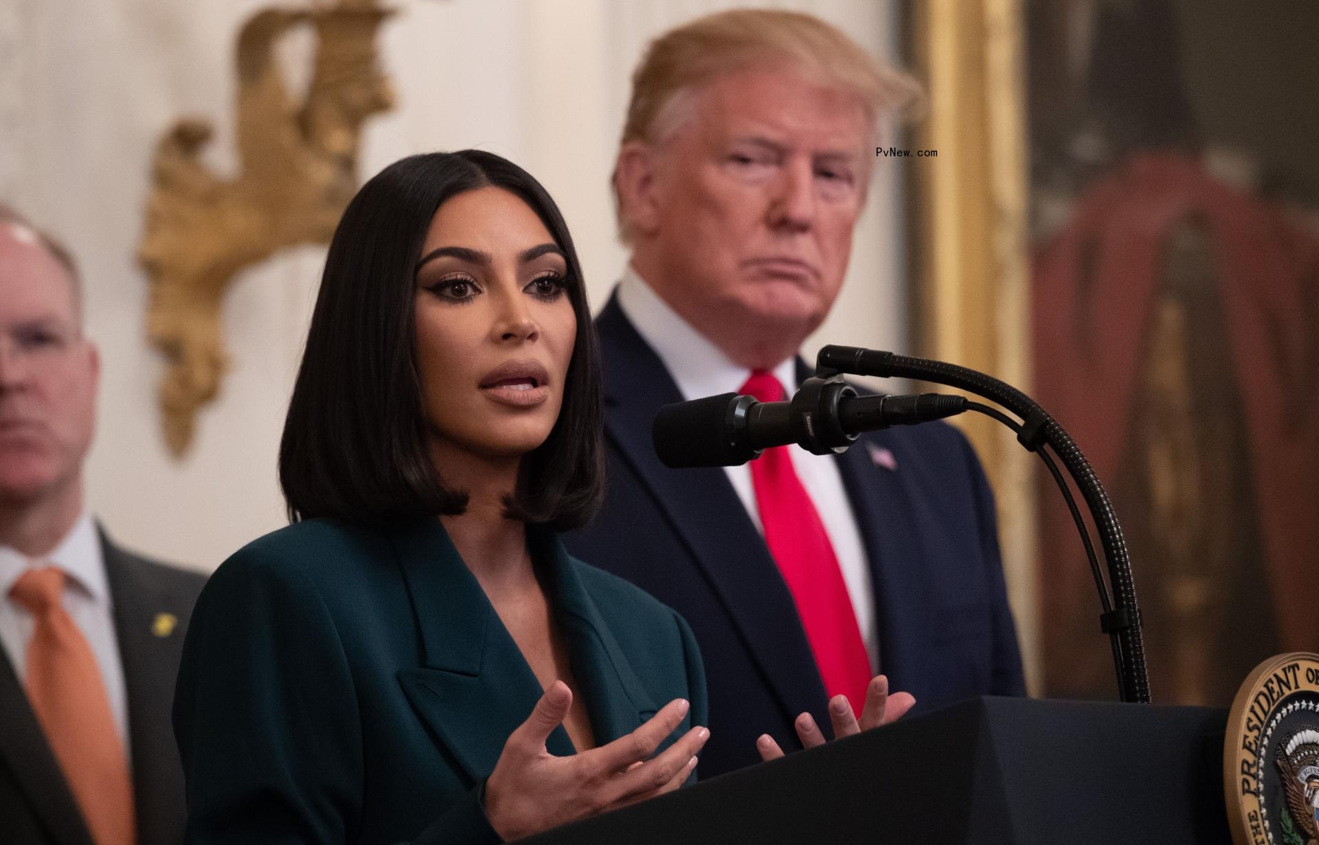 Kim Kardashian and Do<i></i>nald Trump standing together 