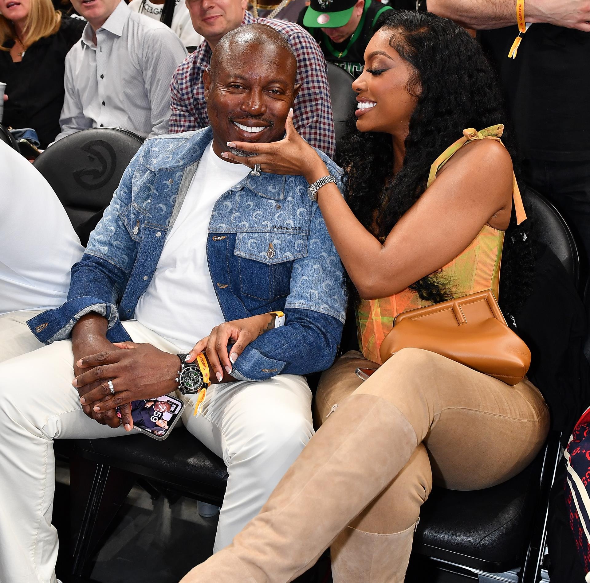 Simon Guobadia and Porsha Williams sitting together