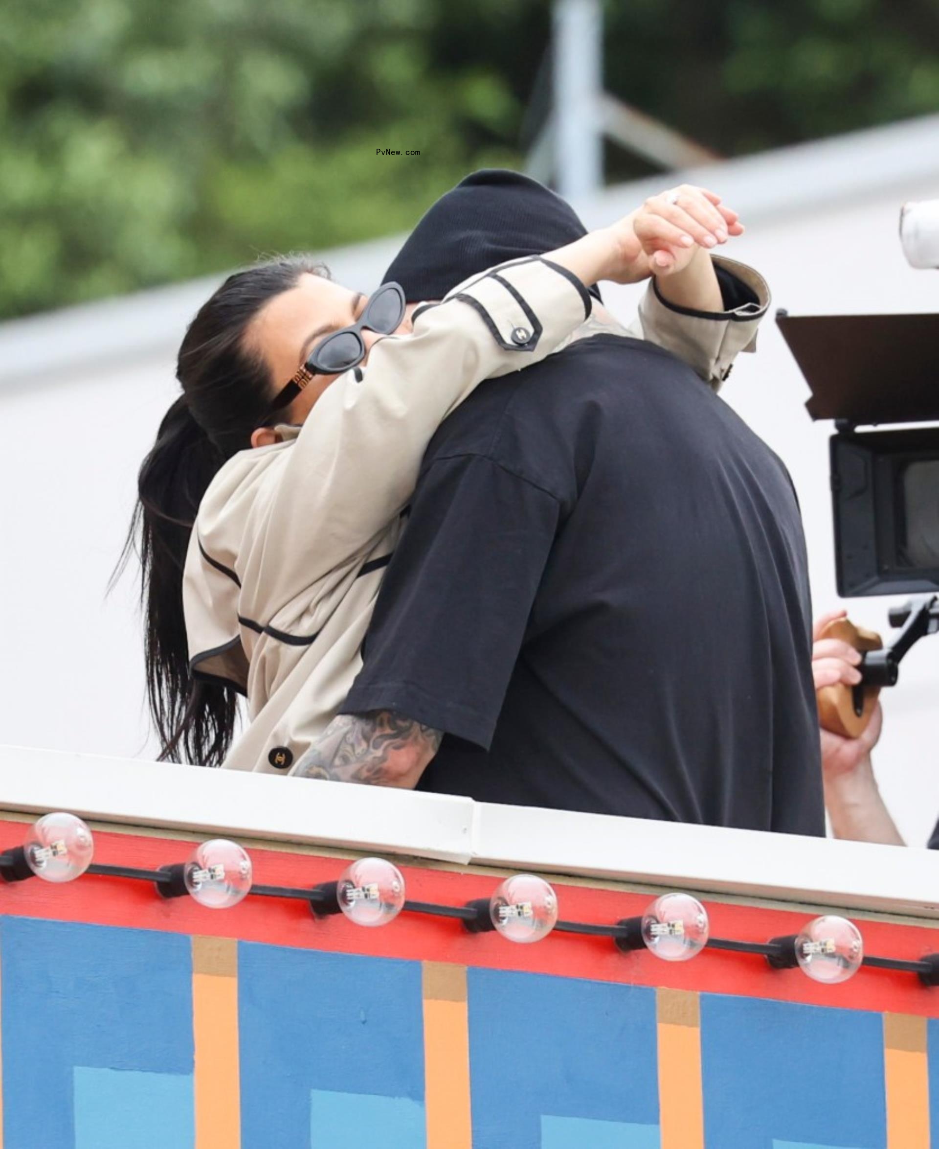 Kourtney Kardashian and Travis Barker kiss