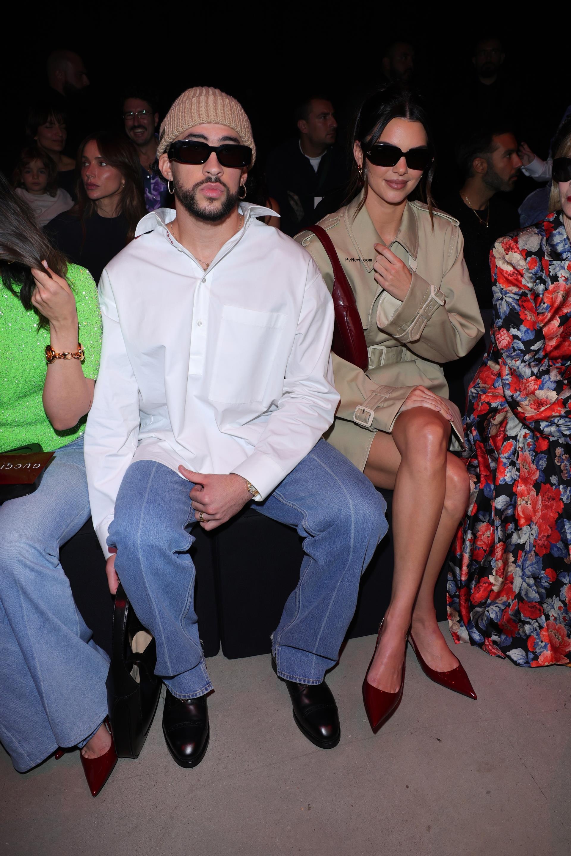 Bad Bunny and Kendall Jenner sitting