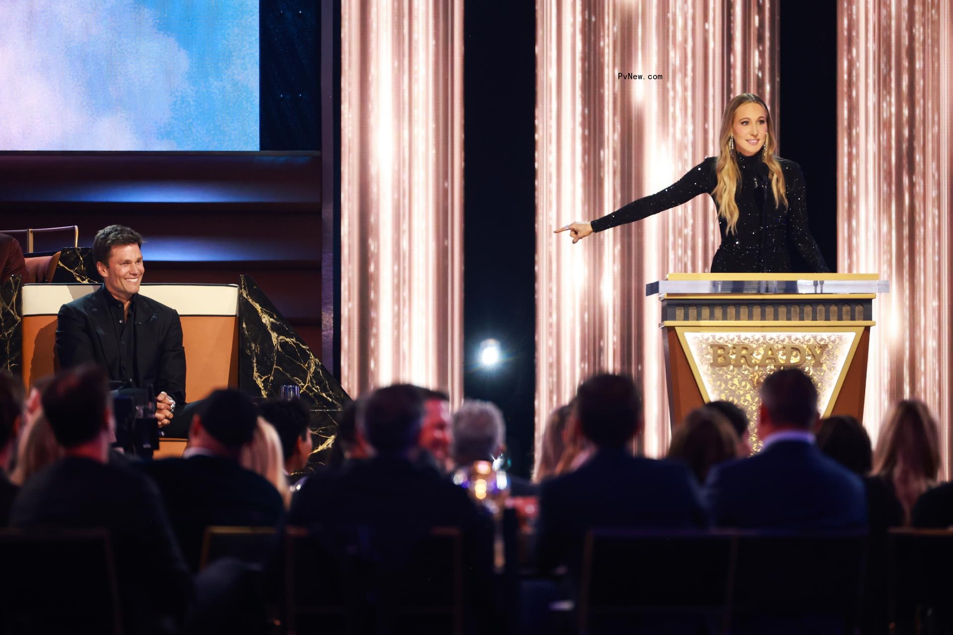 Nikki Glaser and Tom Brady at
