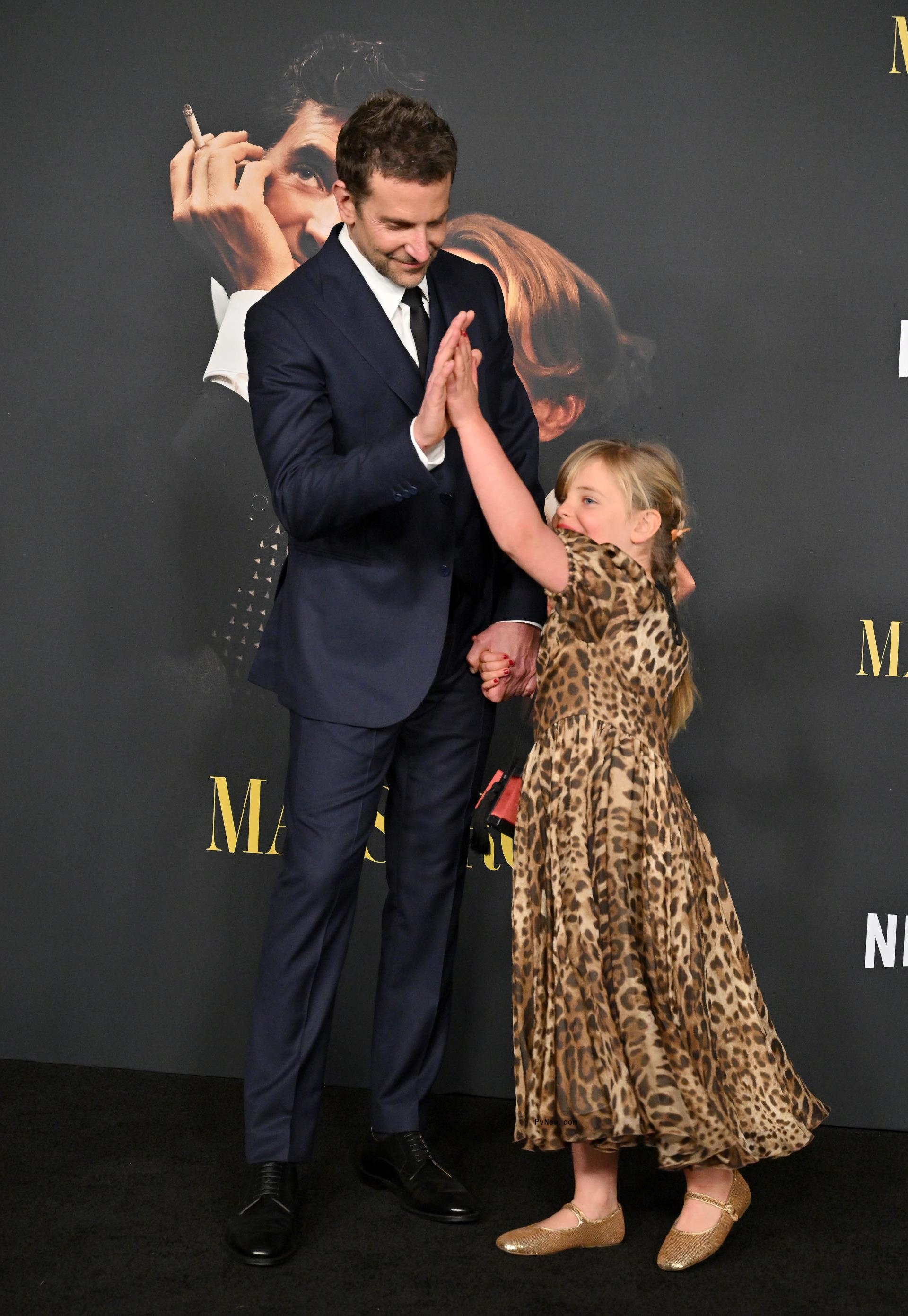 Bradley Cooper high fives with his daughter Lea De Seine.