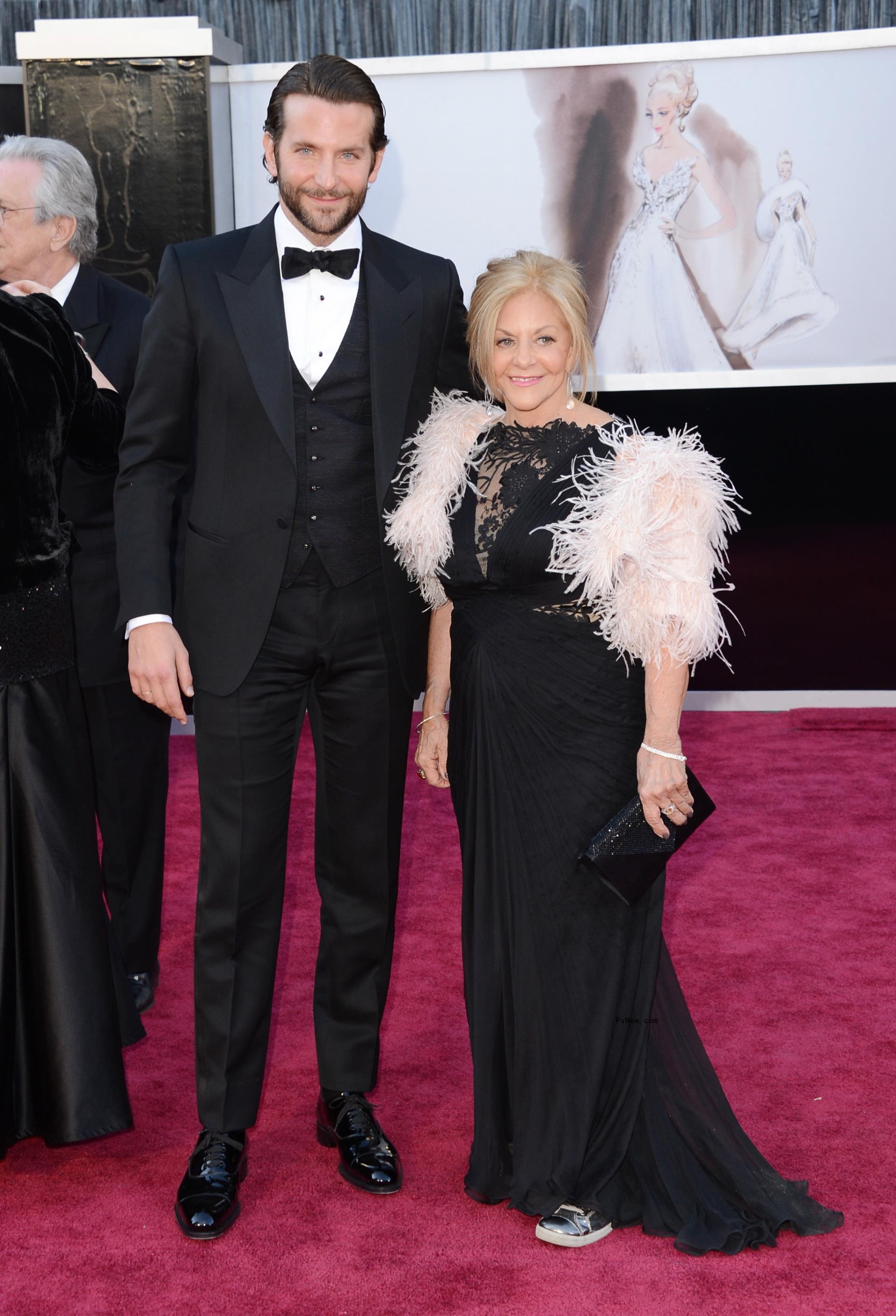 Bradley Cooper and Gloria Campano on the Oscars red carpet.
