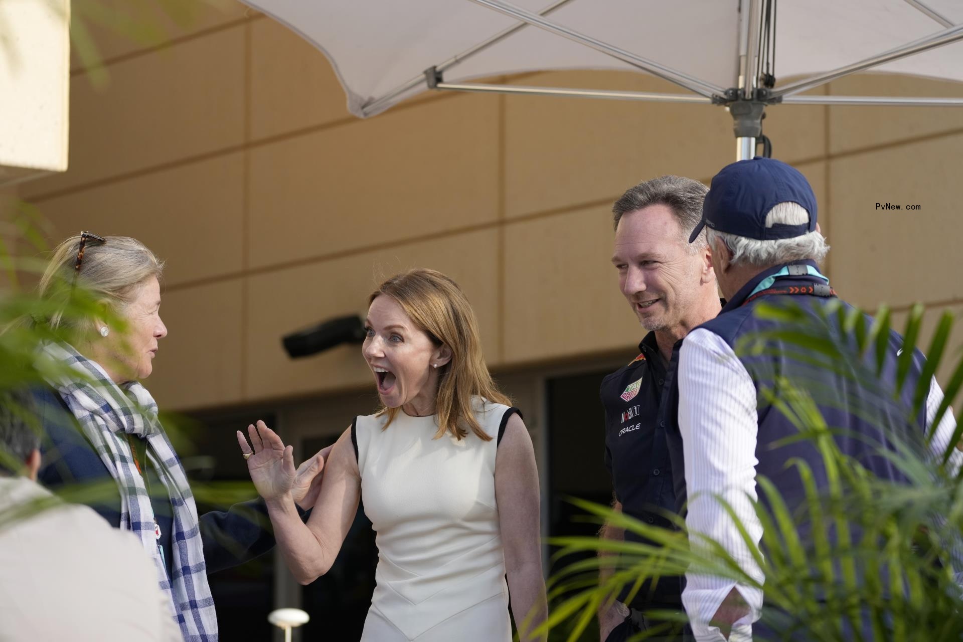 Geri Halliwell and Christian Horner saying hello to friends.