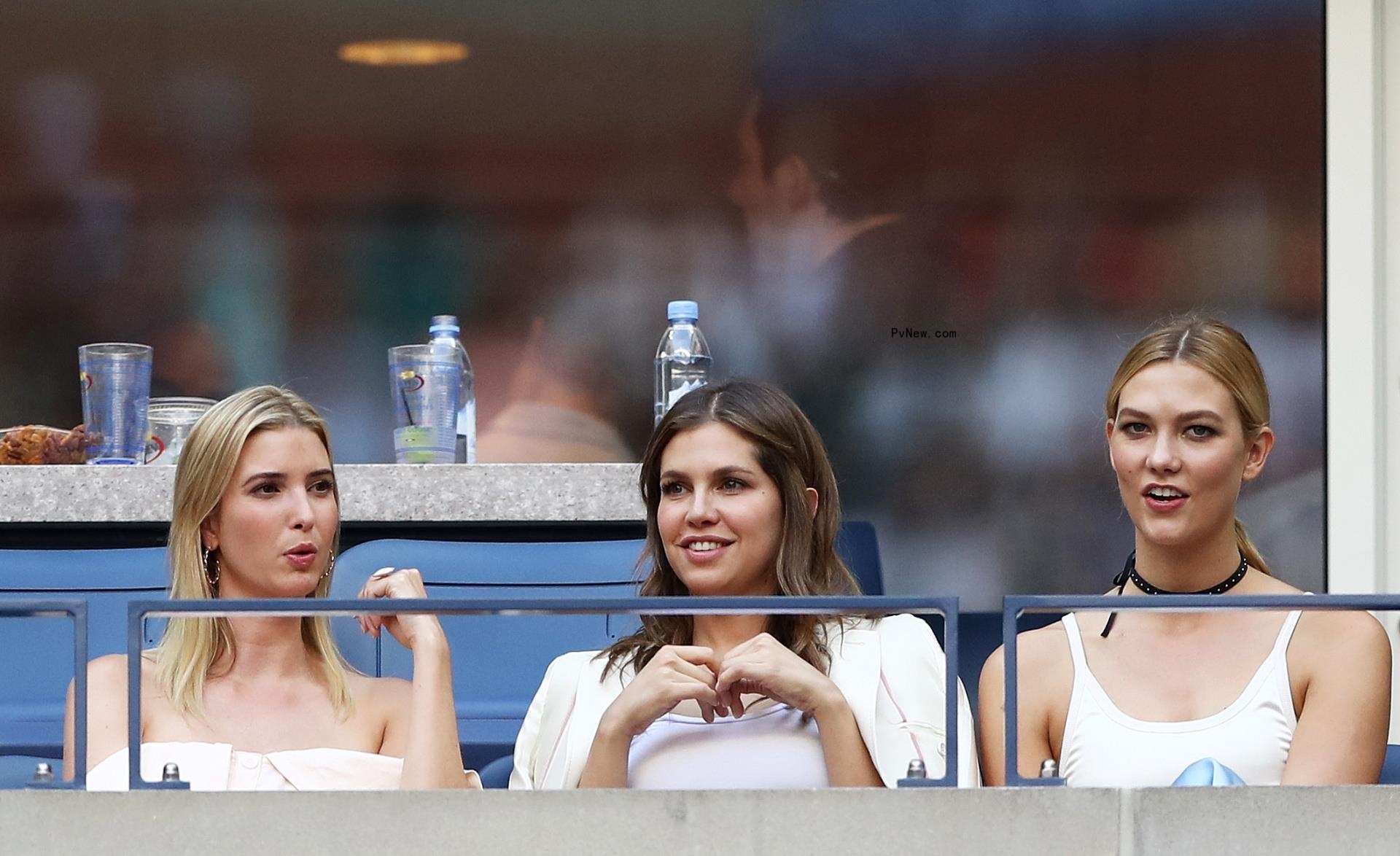 Ivanka Trump, Dasha Zhukova, and Karlie Kloss watch tennis.