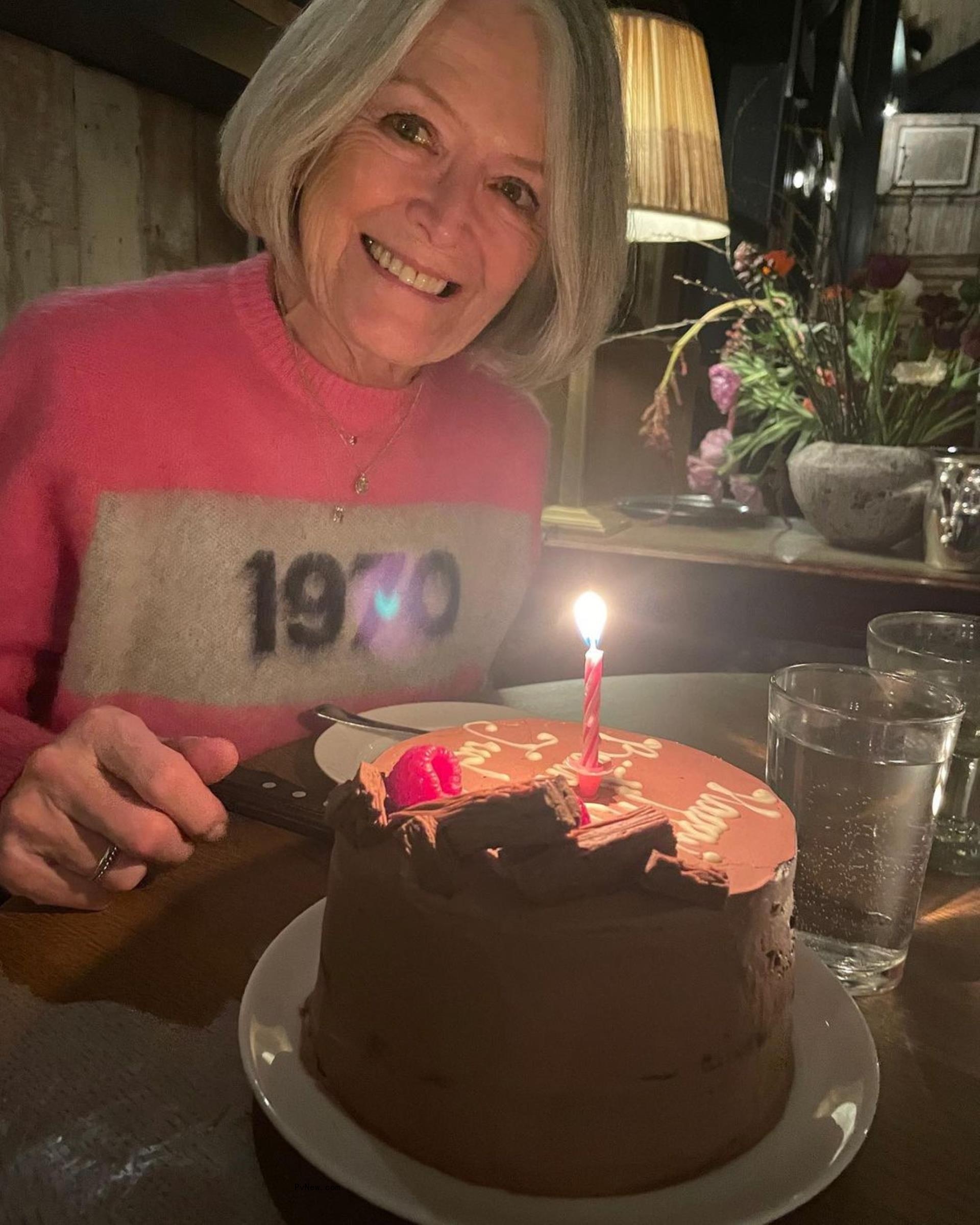 Judy Loe with a birthday cake.