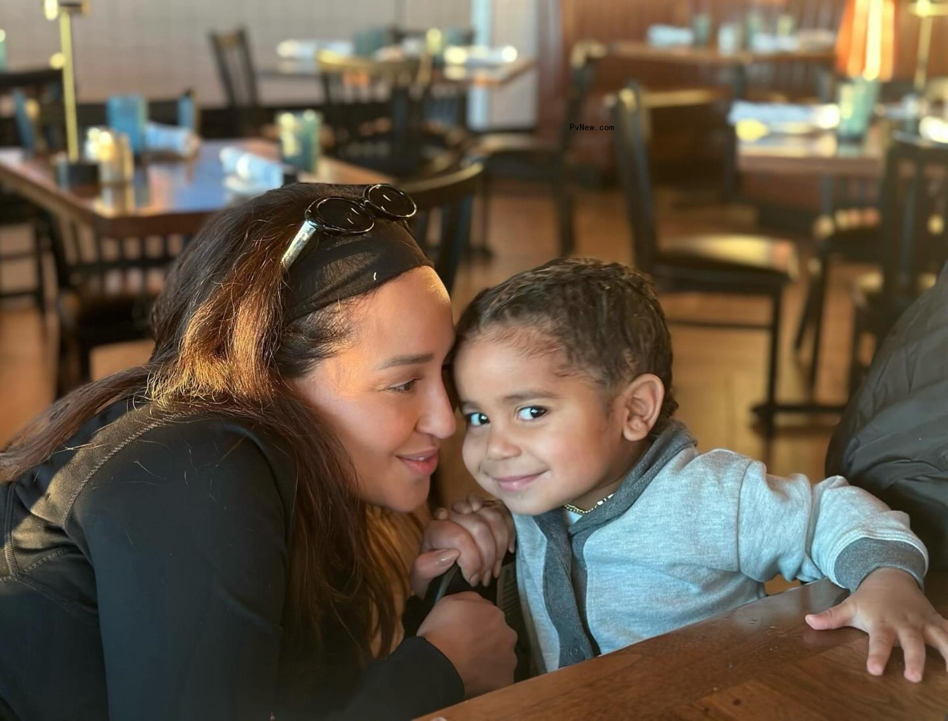 Adrienne Bailon and son