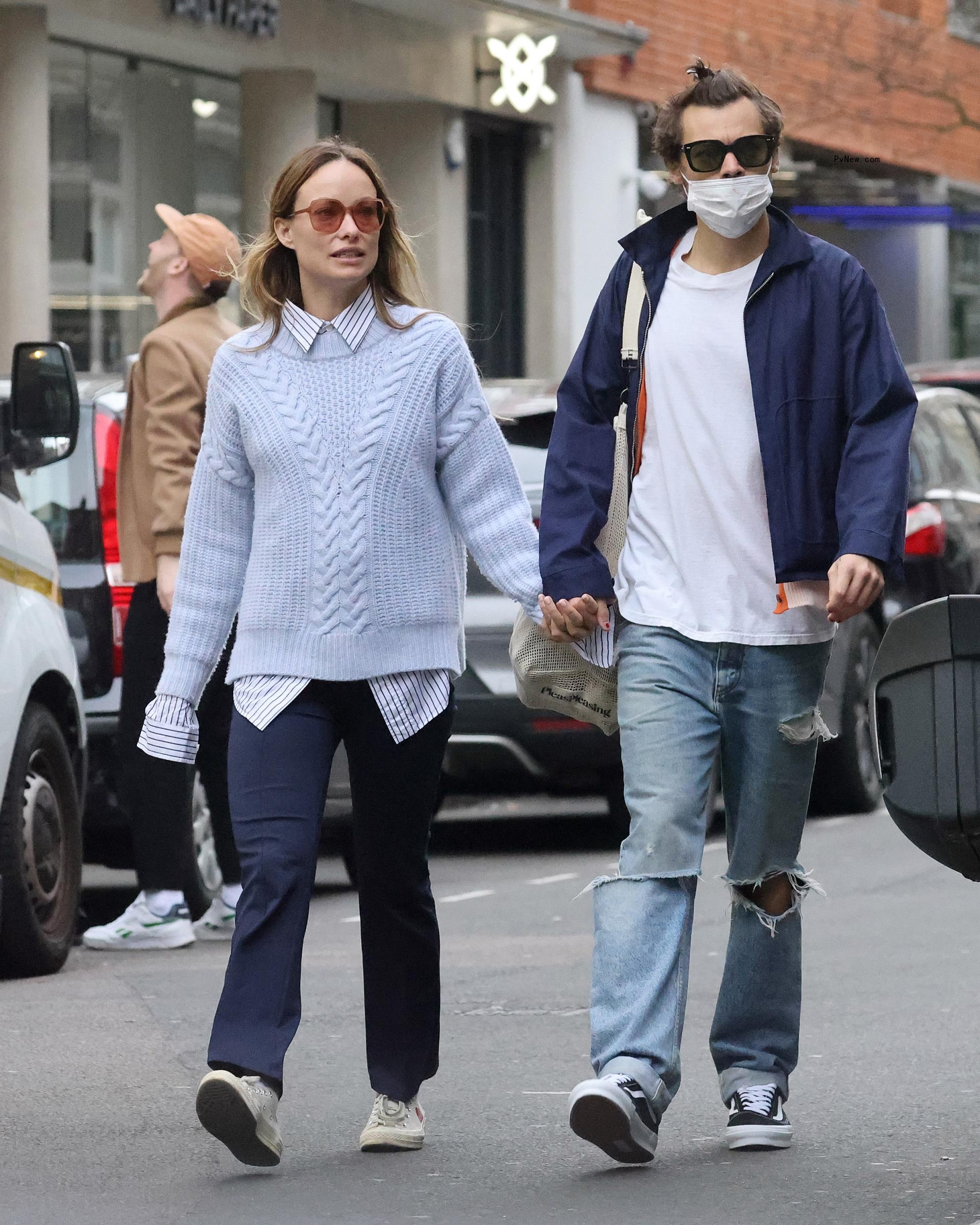 Olivia Wilde and Harry Styles holding hands in London.