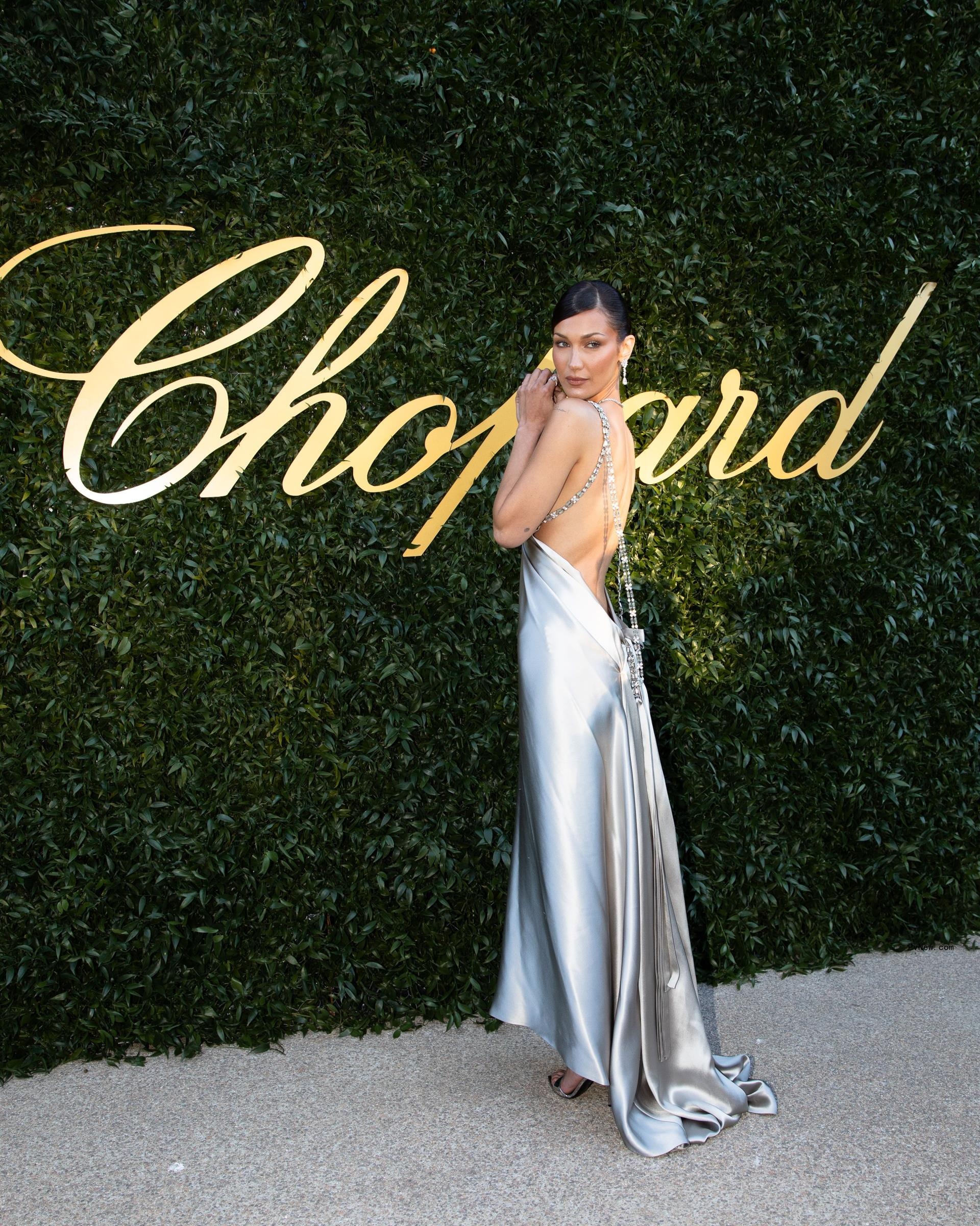 Bella Hadid in a backless silver dress at the 2024 Cannes Film Festival