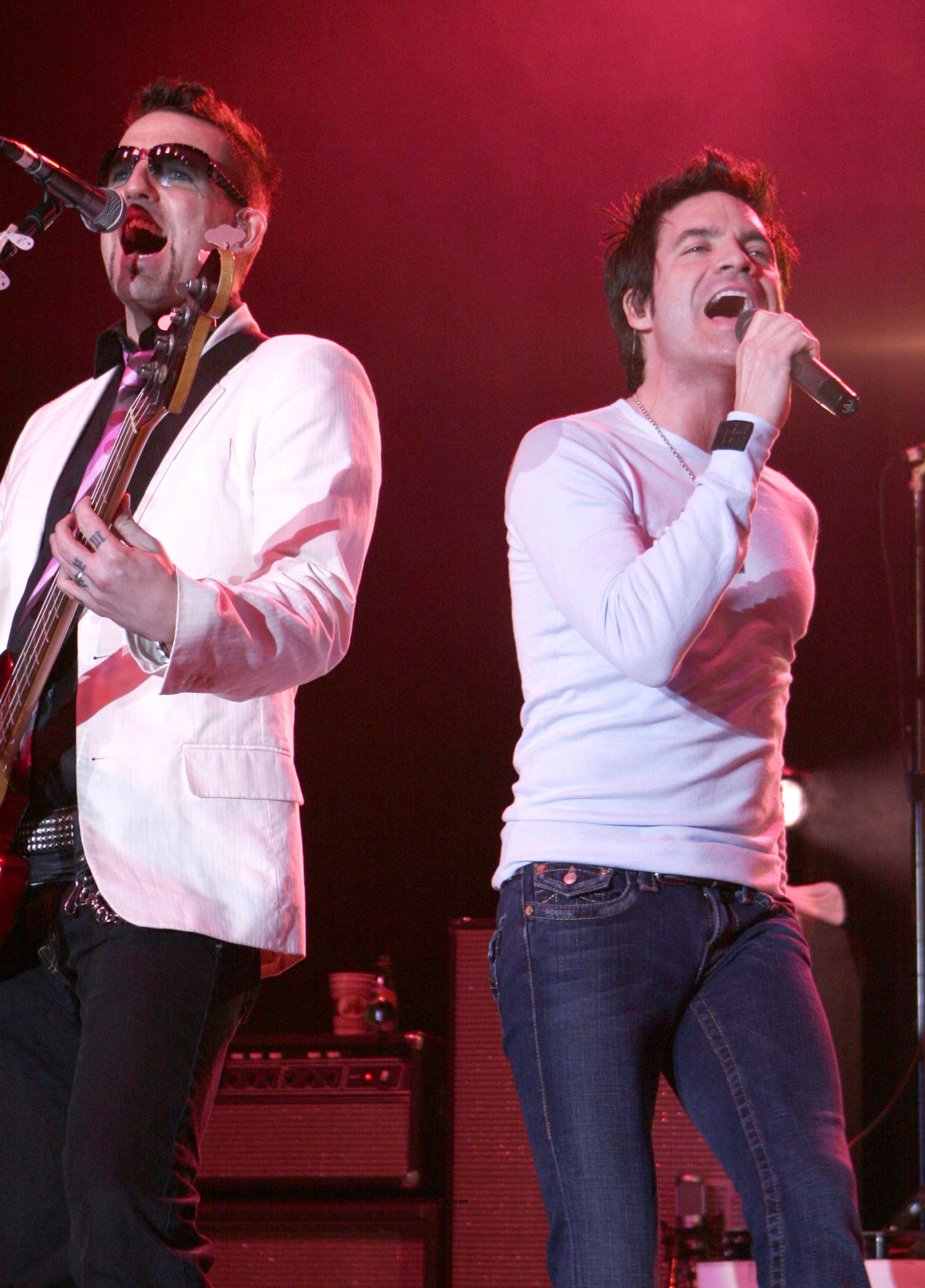 Charlie Colin performing onstage.