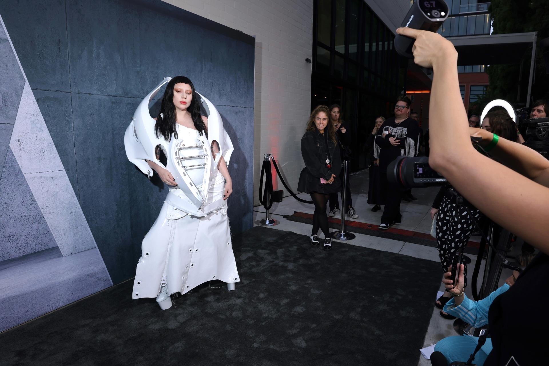 Lady Gaga wears a car part dress to the premiere of 